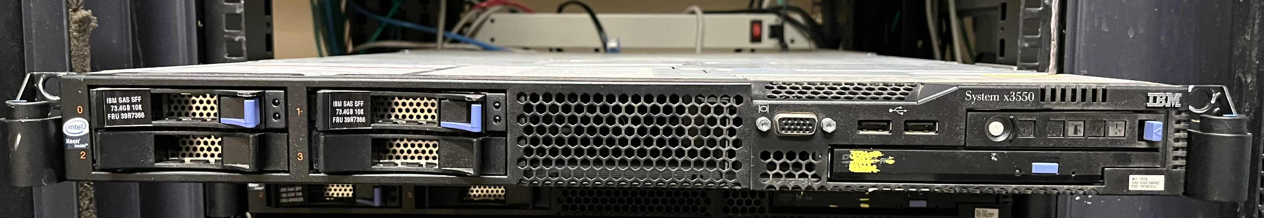 Photo 1 of IBM SYSTEM X3550 SERVER RACK MOUNT MODEL AC1 W 2 IBM X SERIES 73.4GB HARD DIVES MODEL MAX3073RC