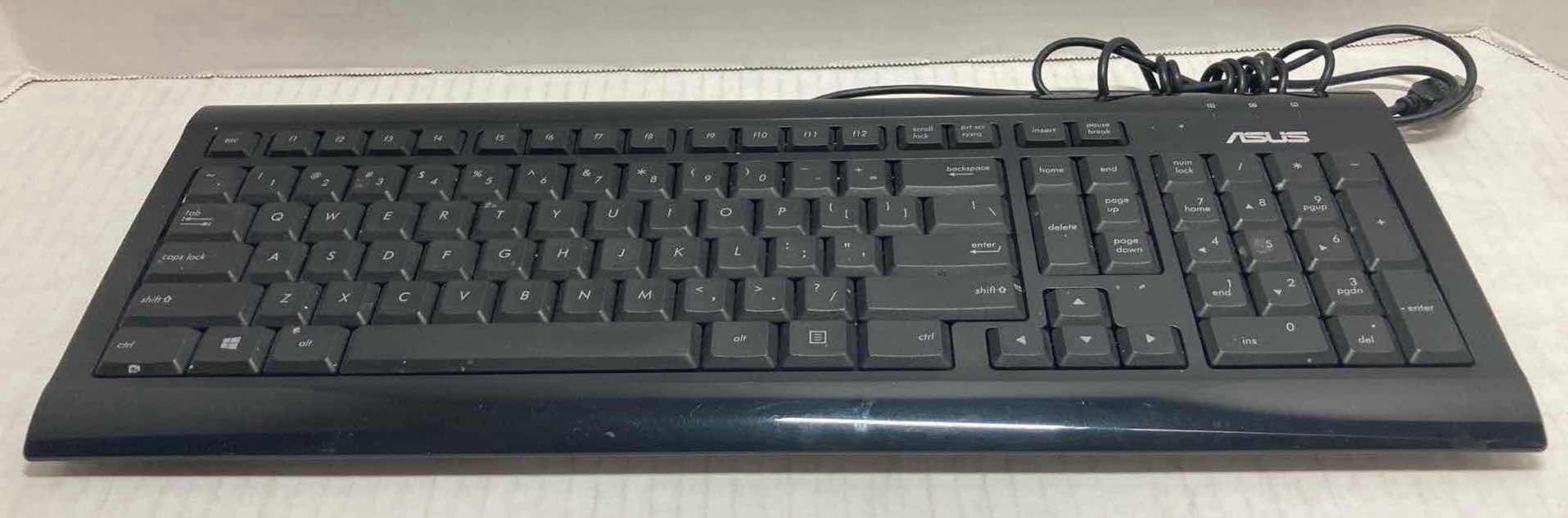 Photo 1 of ASUS COMPUTER KEYBOARD MODEL KB73211