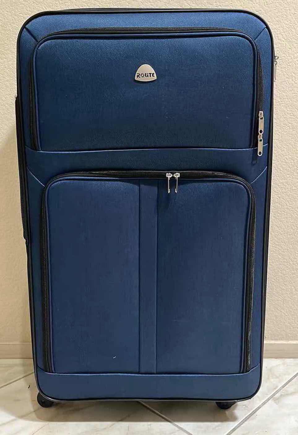 Photo 1 of ROLITE NAVY BLUE ROLLING LUGGAGE CHECK BAG