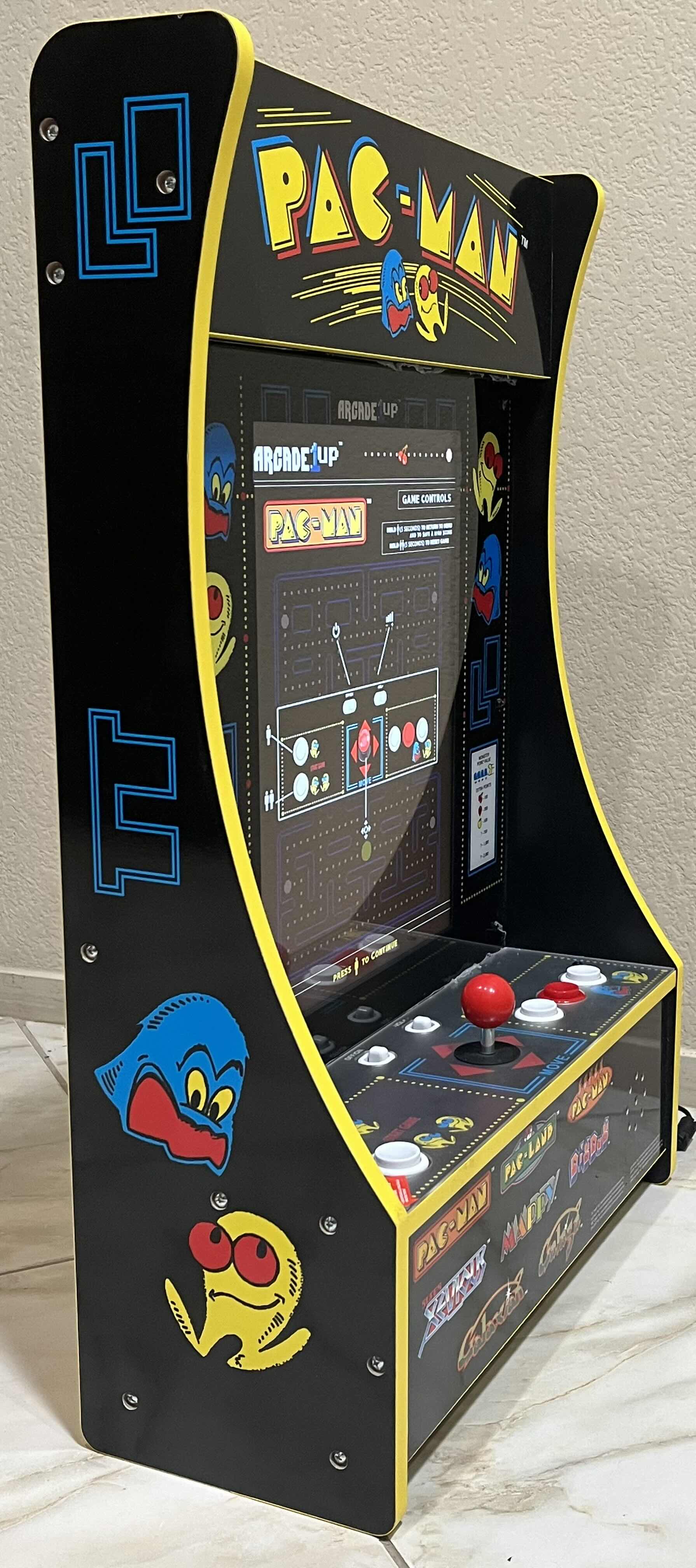 Photo 2 of ARCADE 1 UP PAC-MAN PARTY-CADE 8 IN 1 KIDS MINI 17” SCREEN GAMING MACHINE MODEL 8274 Q4 PACMAN PARTYCADE