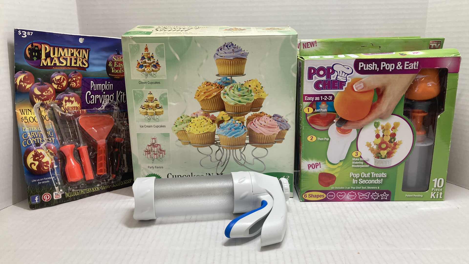 Photo 1 of PUMPKIN CARVING SET, CUPCAKE STAND, COOKIE DISPENSER & POP CHEF