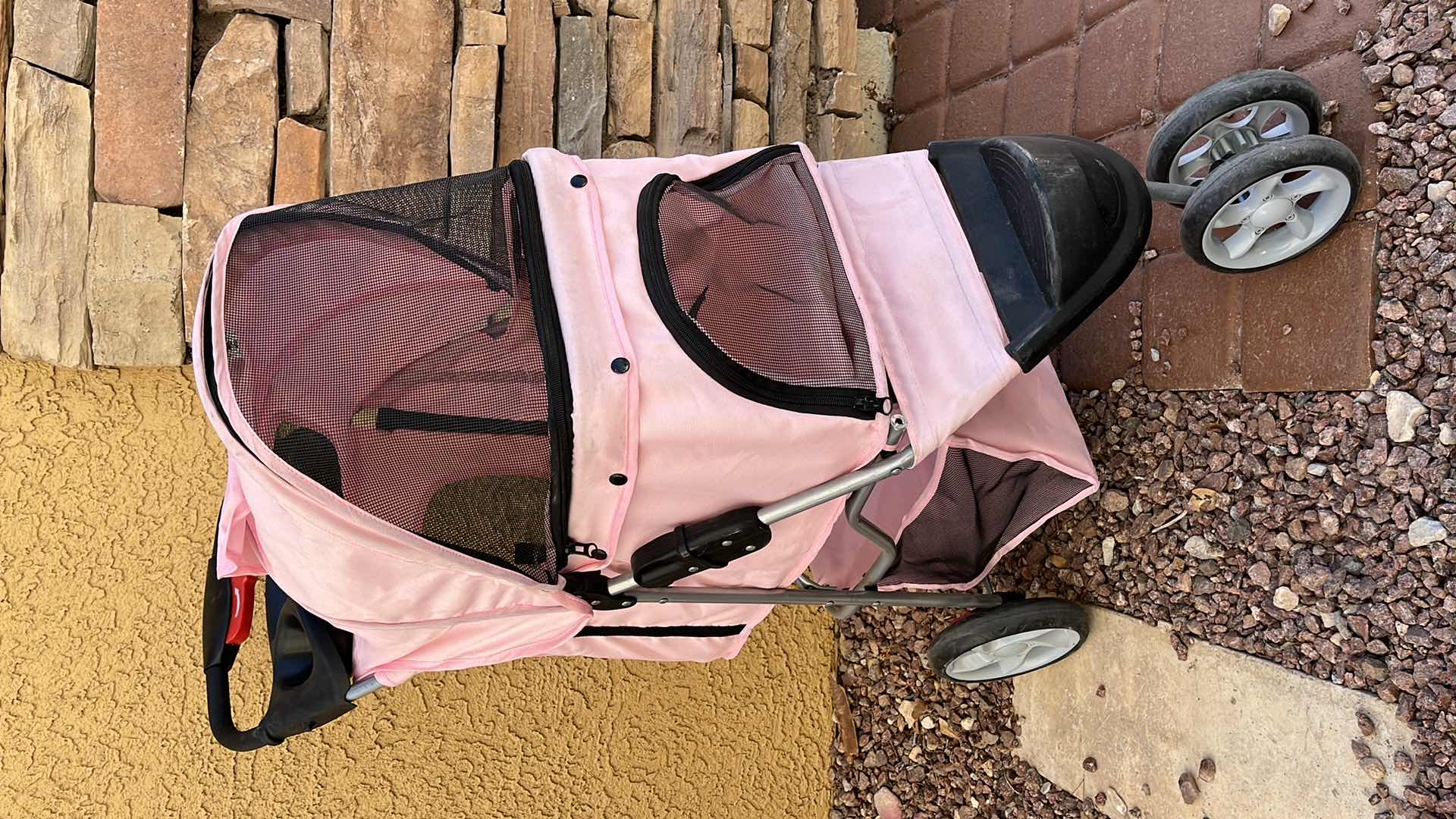 Photo 1 of PINK ENCLOSED SMALL PET STROLLER