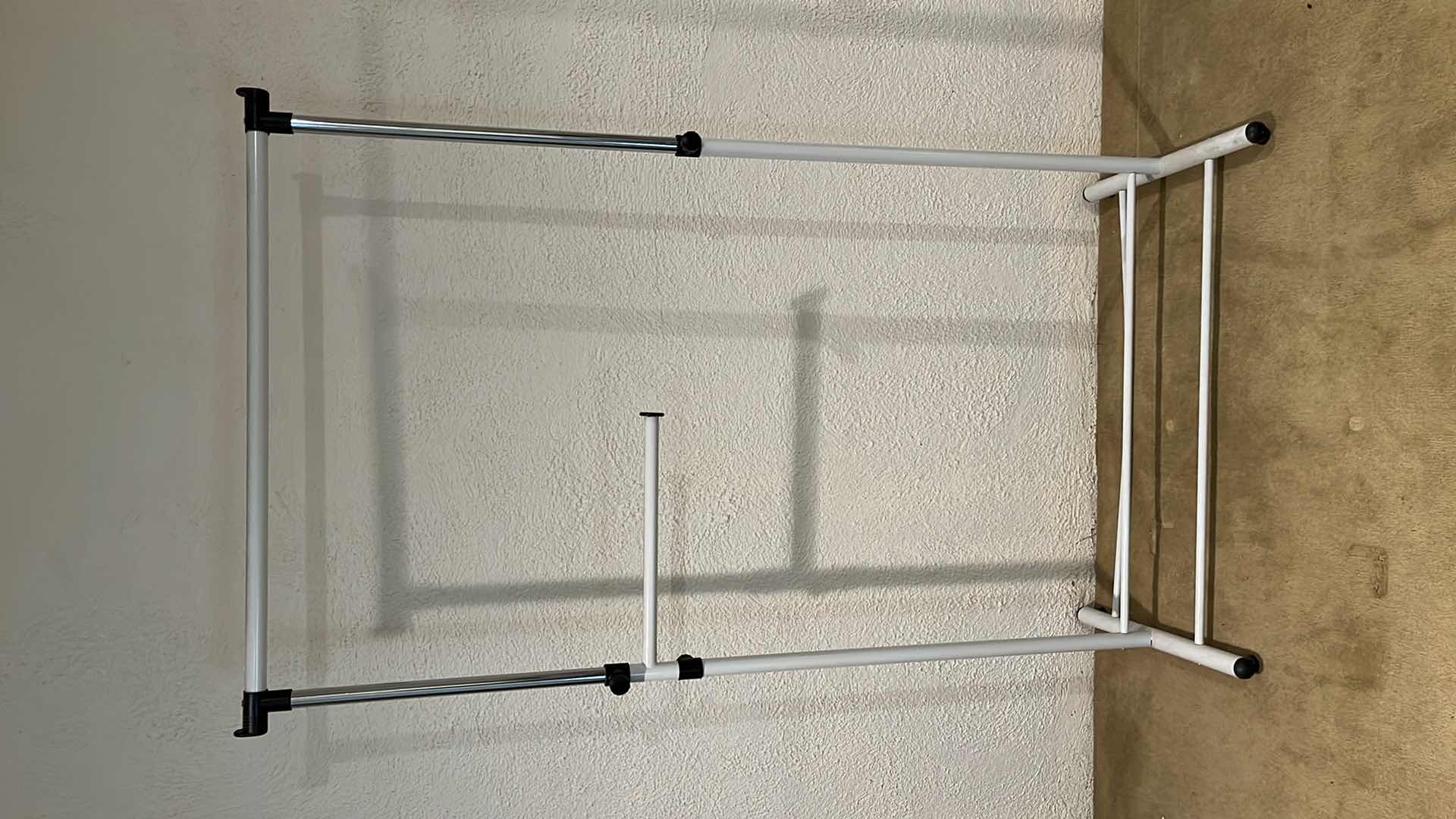 Photo 1 of WHITE FINISH METAL STATIONARY CLOTHING RACK 41” X 22” H68”