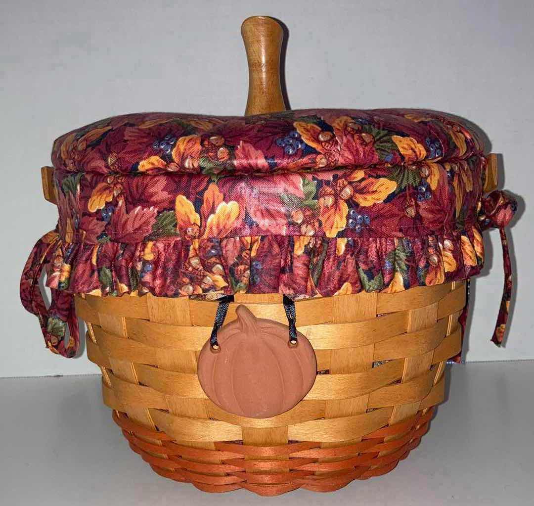 Photo 1 of LONGABERGER 1995 PUMPKIN SHAPE MAPLE WOOD BASKET W FALL FOLIAGE FABRIC LINER & BASKET PROTECTOR 9.25” X 9.25” H7.25”