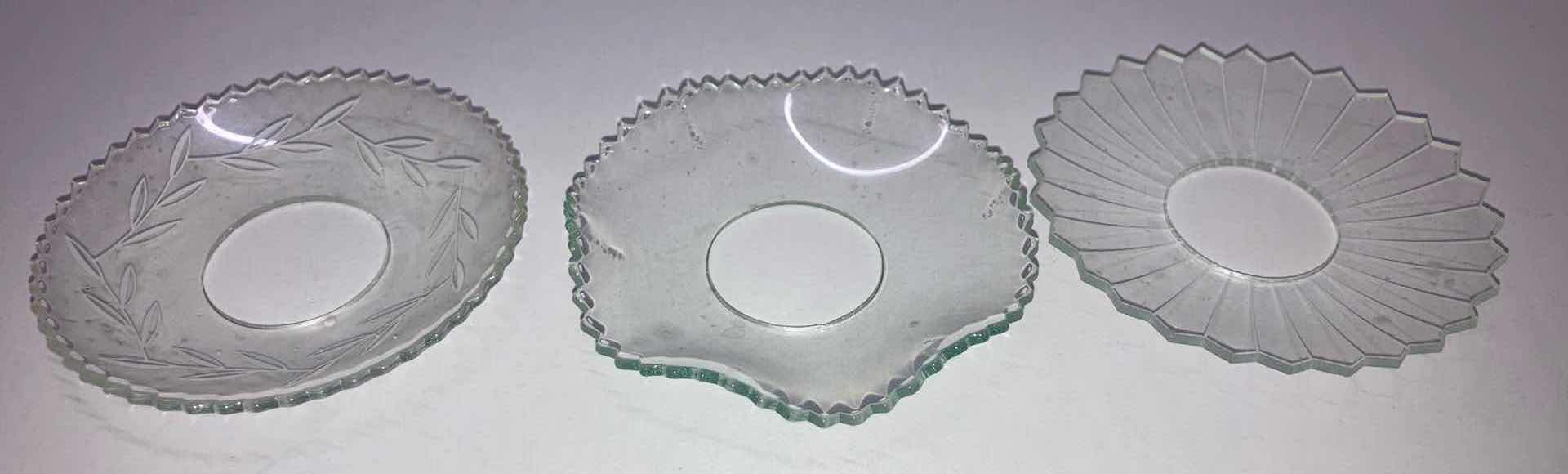 Photo 2 of CLEAR GLASS CANDLE WAX DRIP CATCHER (12).  2.75”