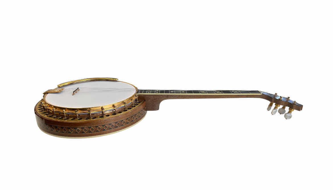 Photo 1 of LUDWIG CORT TENOR BANJO W ORIGINAL LEATHER HARD CASE