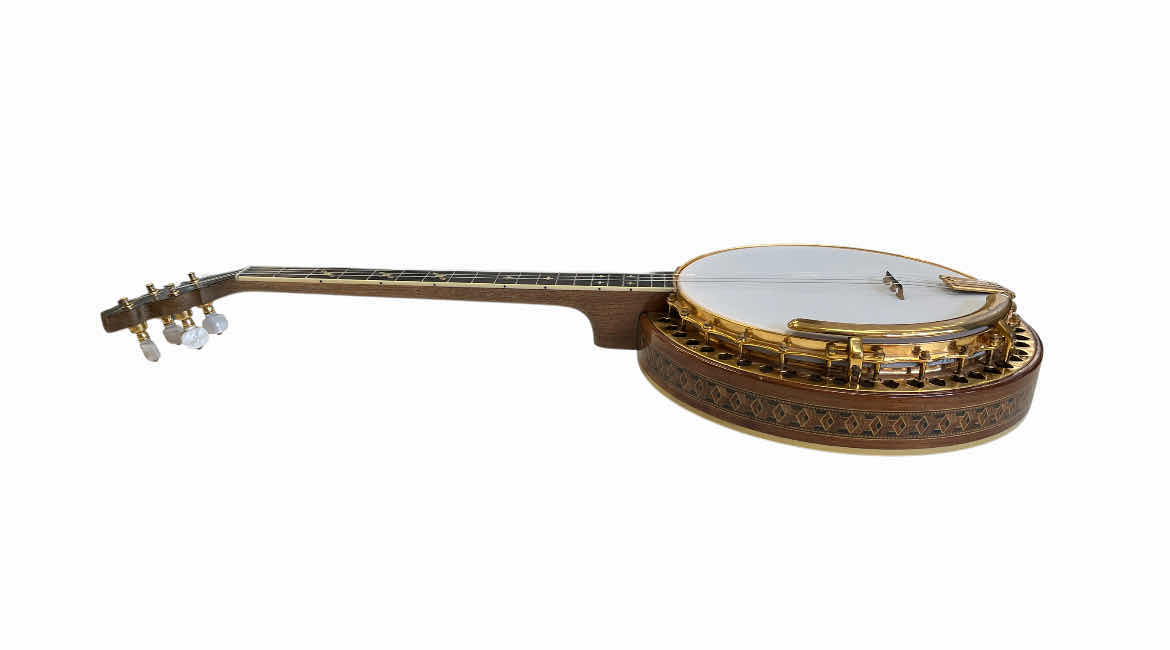 Photo 1 of LUDWIG CORT TENOR BANJO W ORIGINAL LEATHER HARD CASE