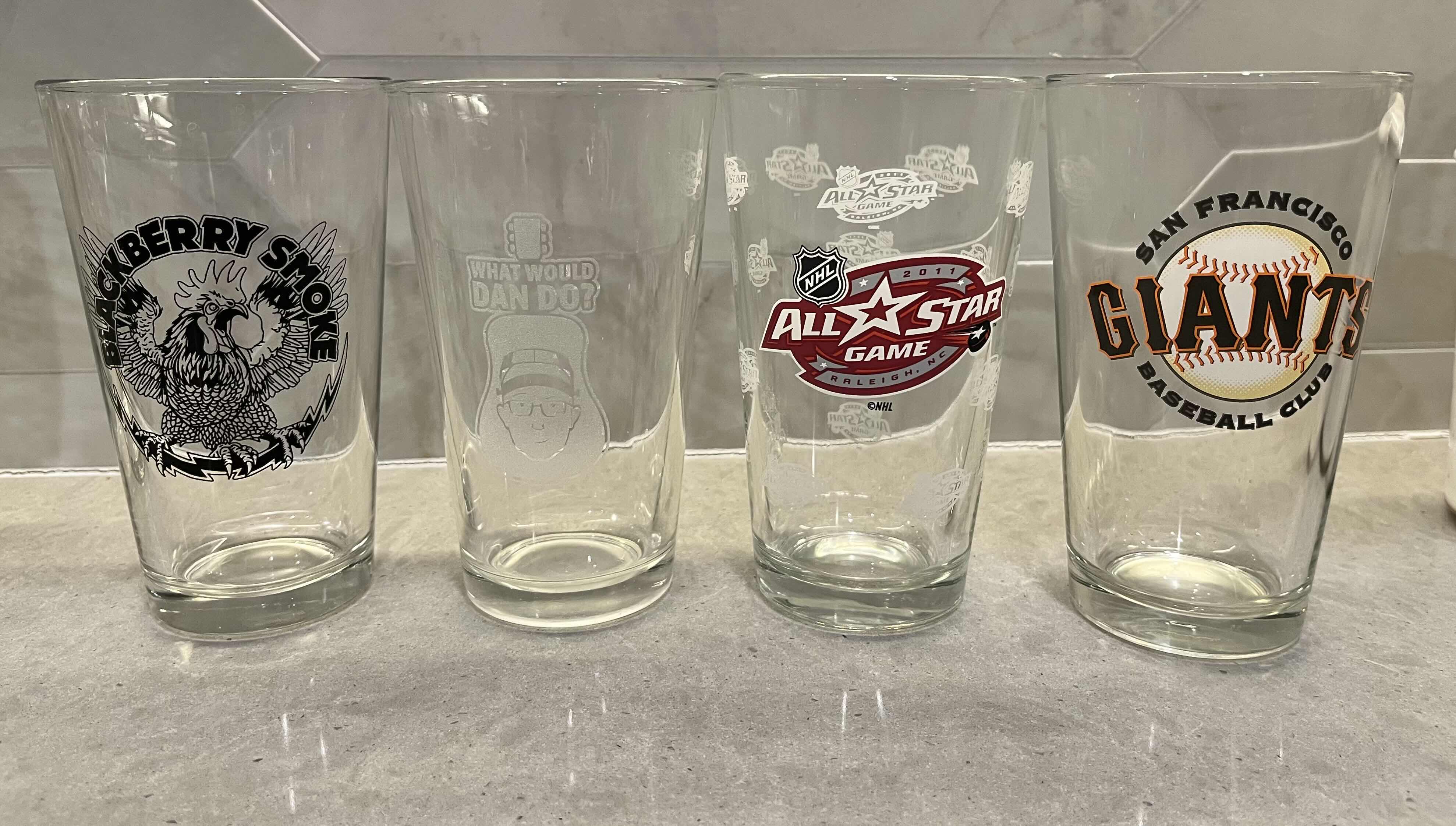 Photo 1 of BREWING COMPANY & SPORTS THEMED BEER GLASSES (12)