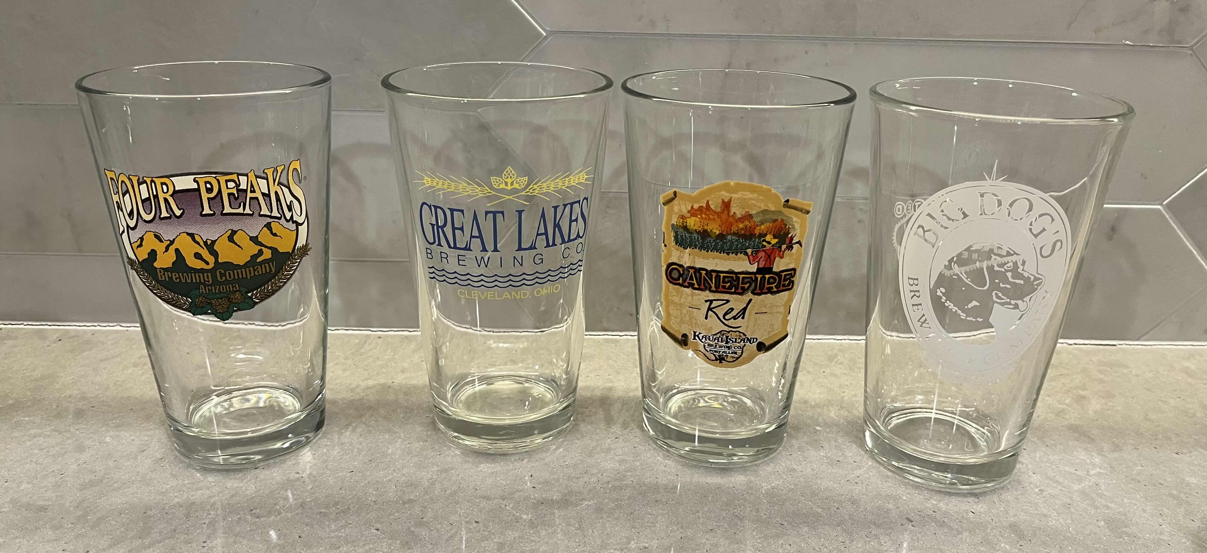 Photo 1 of BREWING COMPANY & SPORTS THEMED BEER GLASSES (12)