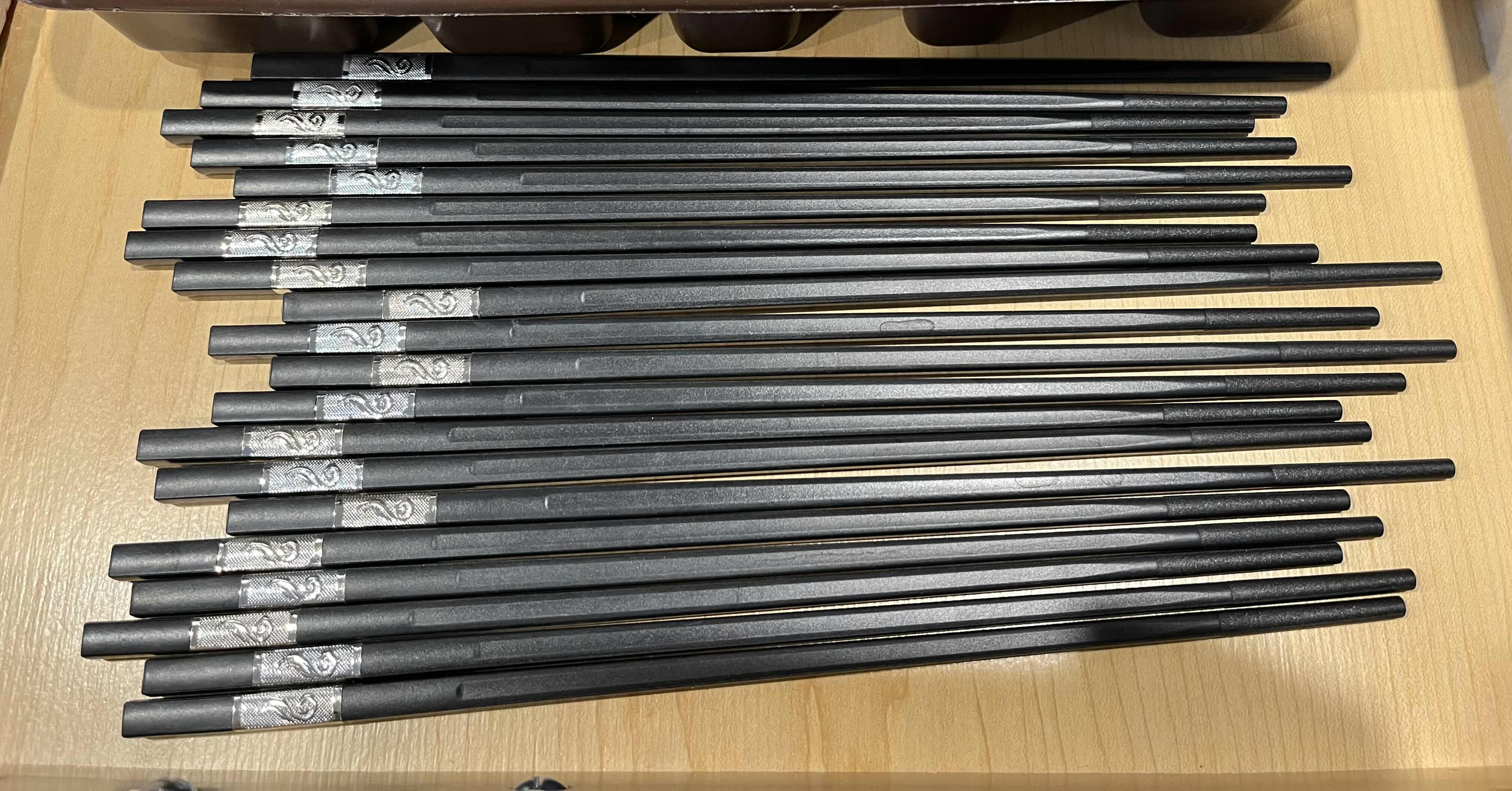 Photo 1 of JA HENCKELS INTERNATIONAL FLATWARE SET, RUBBERMAID FLATWARE CADDY, FANCY BLACK CHOP STICKS & DISPOSABLE WOOD CHOPSTICKS