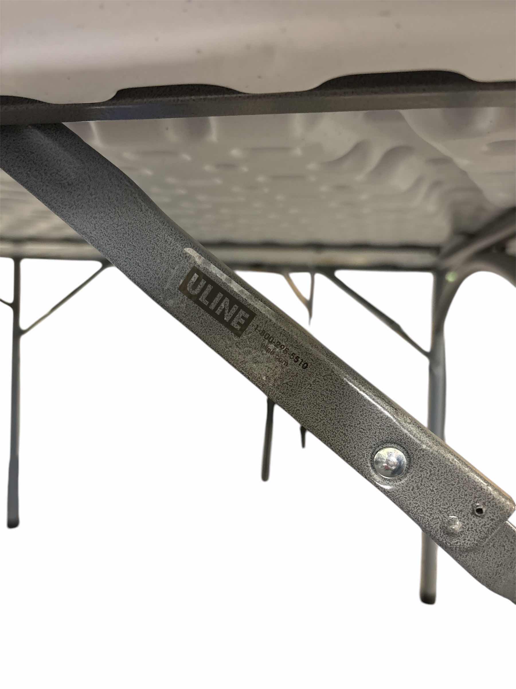 Photo 1 of 60” ULINE ROUND FOLDING TABLE