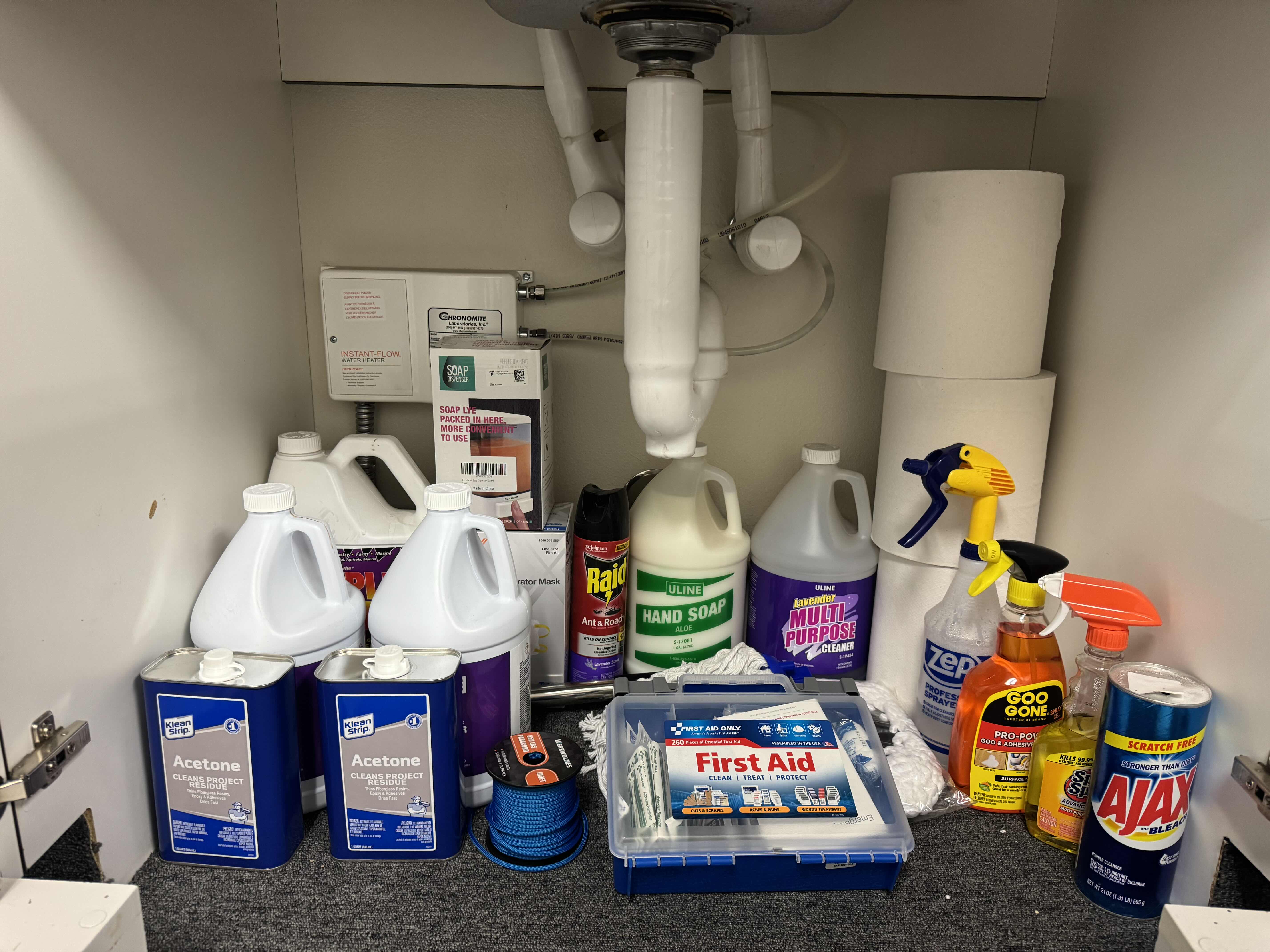 Photo 1 of CONTENTS OF CABINET- INDUSTRIAL CLEANING SUPPLIES W FIRST AID