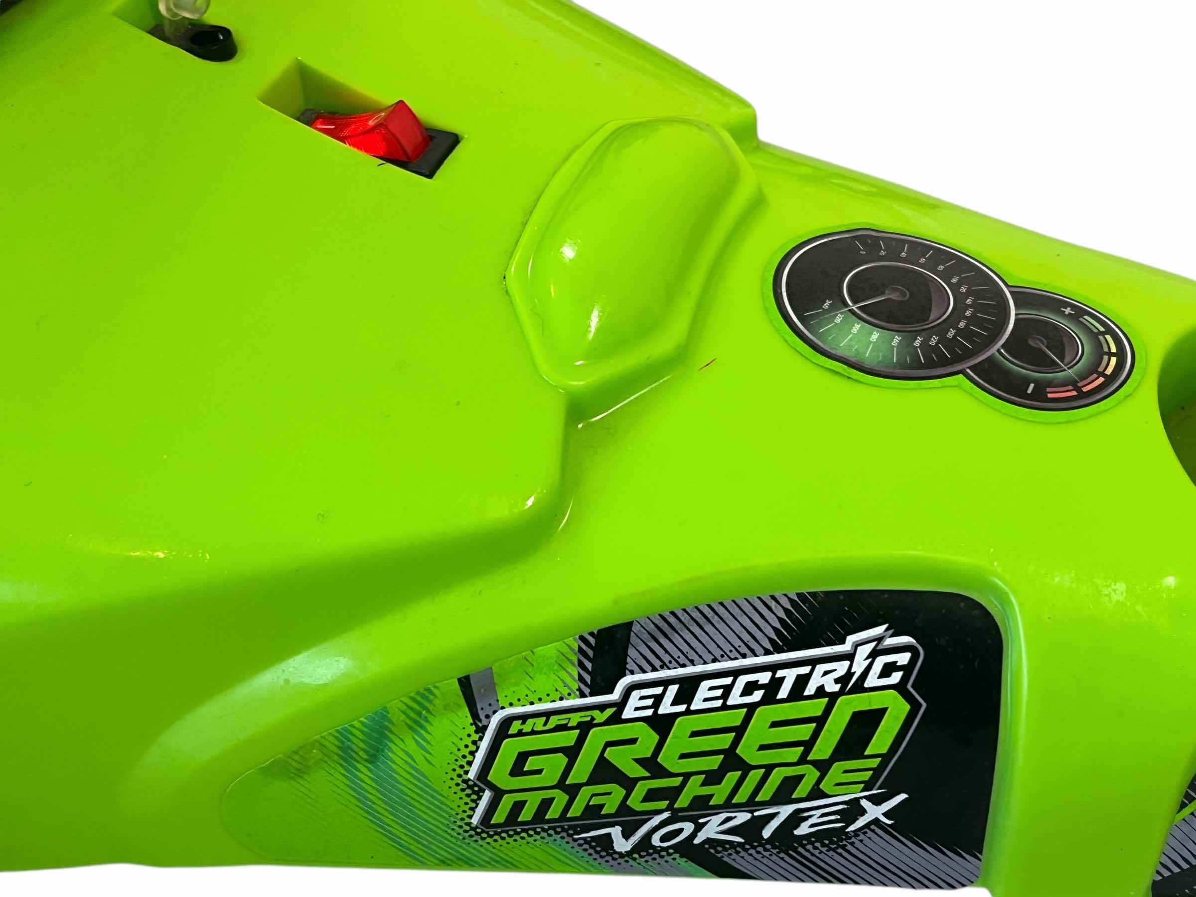 Photo 1 of HUFFY ELECTRIC GREEN MACHINE VORTEX W CHARGER