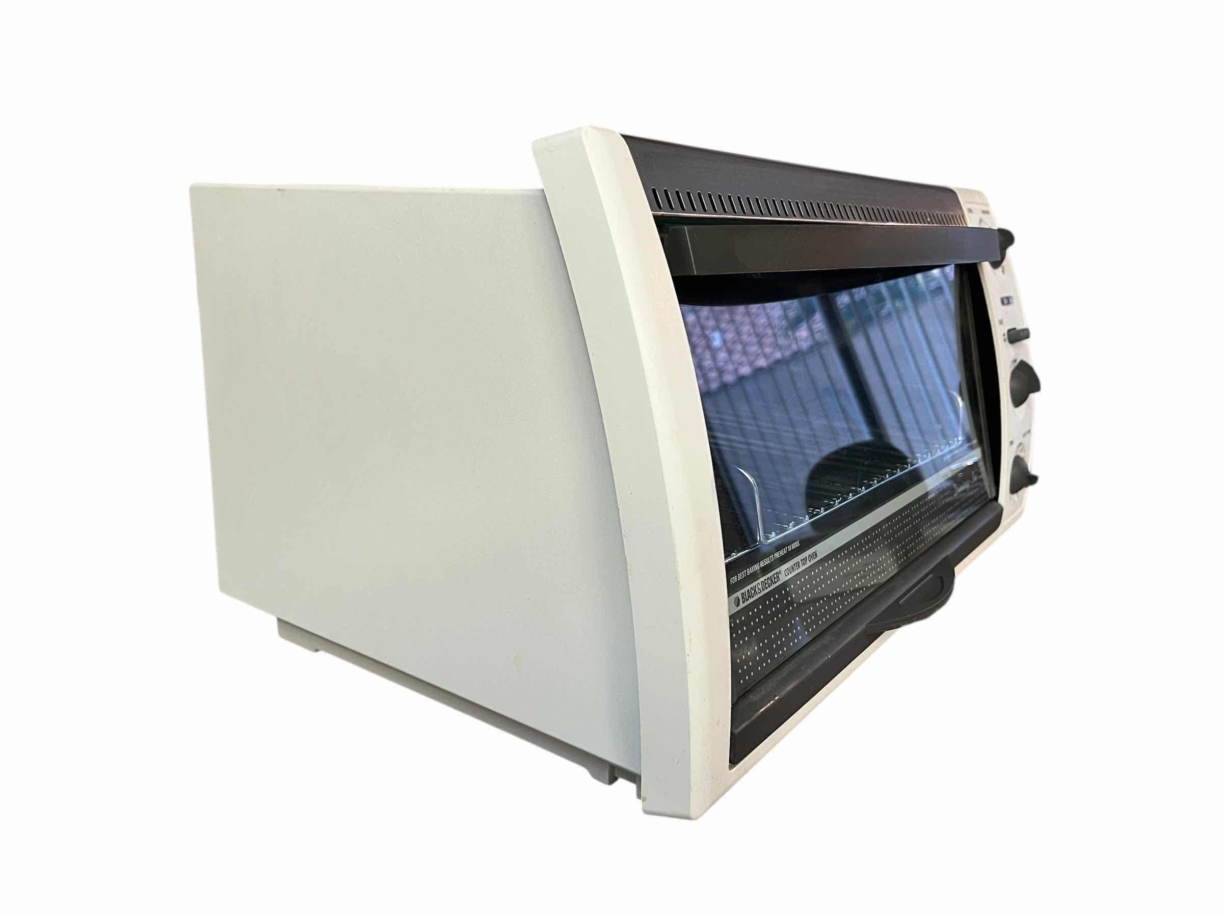 Photo 1 of BLACK & DECKER DINING-IN TOASTER OVEN BROILER