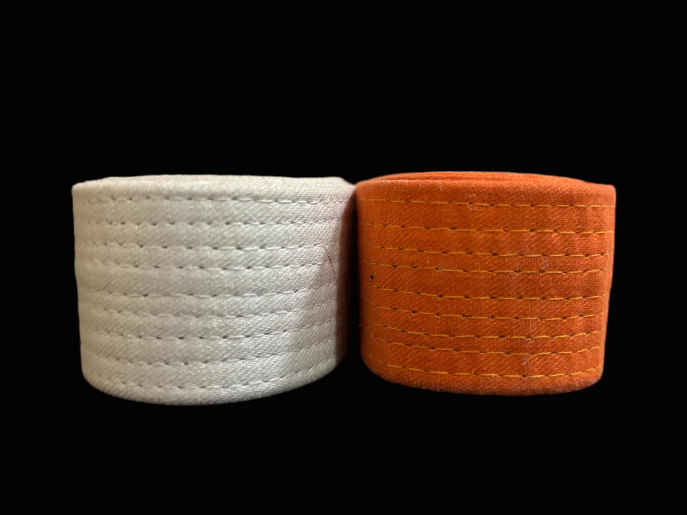 Photo 1 of KI DELUXE COLOR BELTS (2), ADULT SIZE 4, WHITE & ORANGE