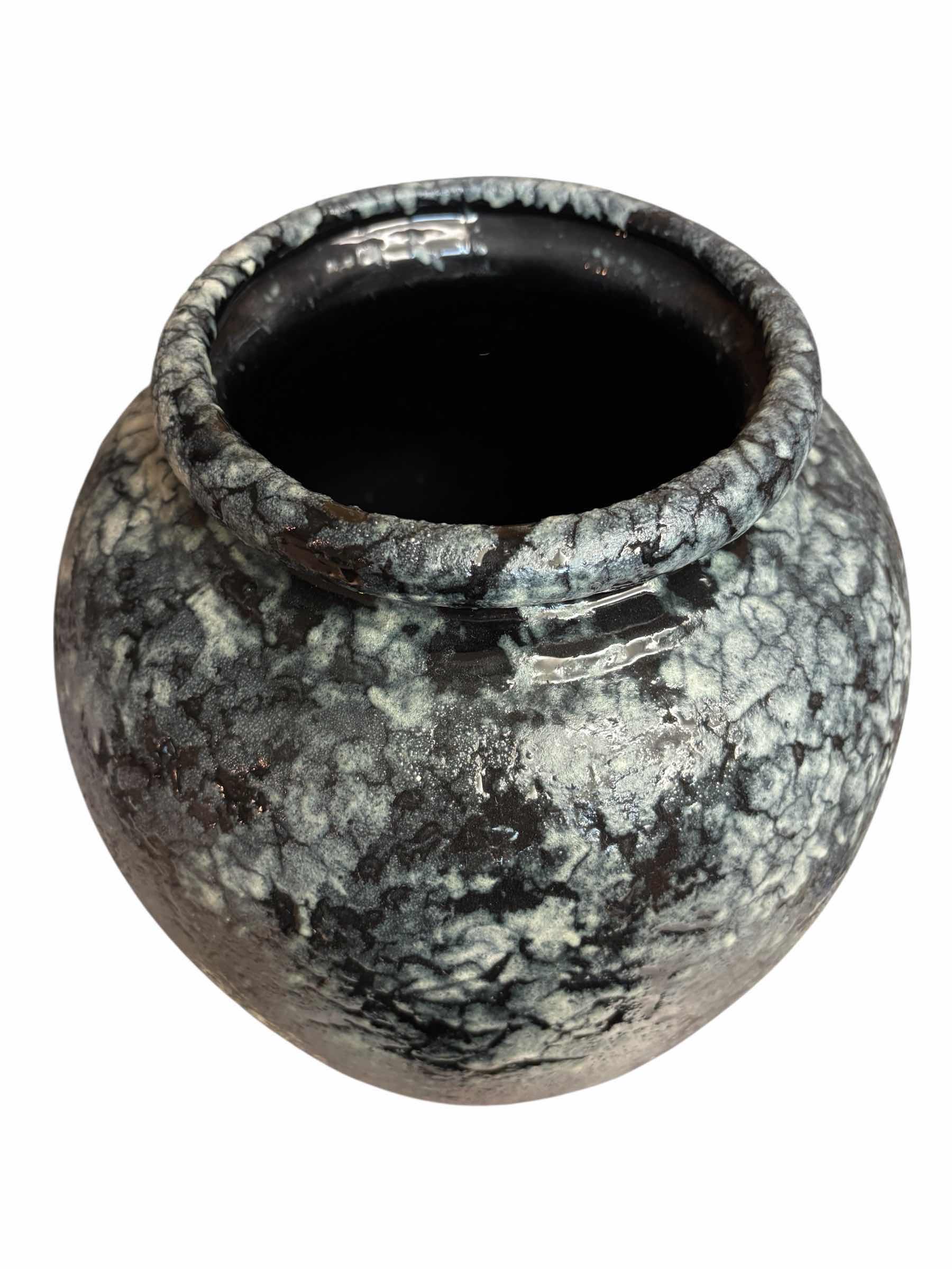 Photo 1 of DECORATIVE BLACK/WHITE TEXTURED VASE 11”D X H16”