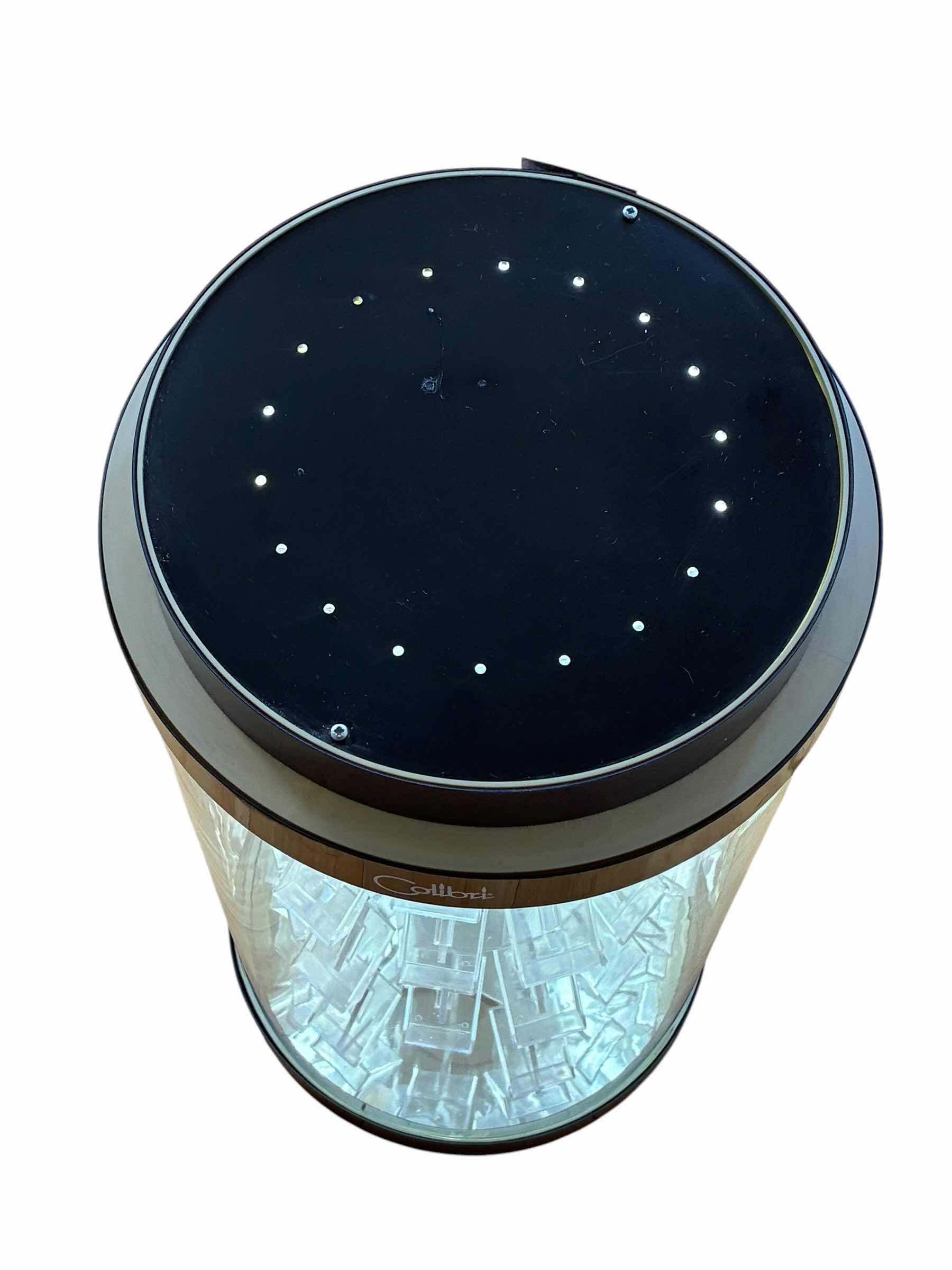 Photo 1 of COLIBRI 36PC AUTOMATED LIGHT UP ROTATINGROUND DISPLAY CASE 10” X 20”