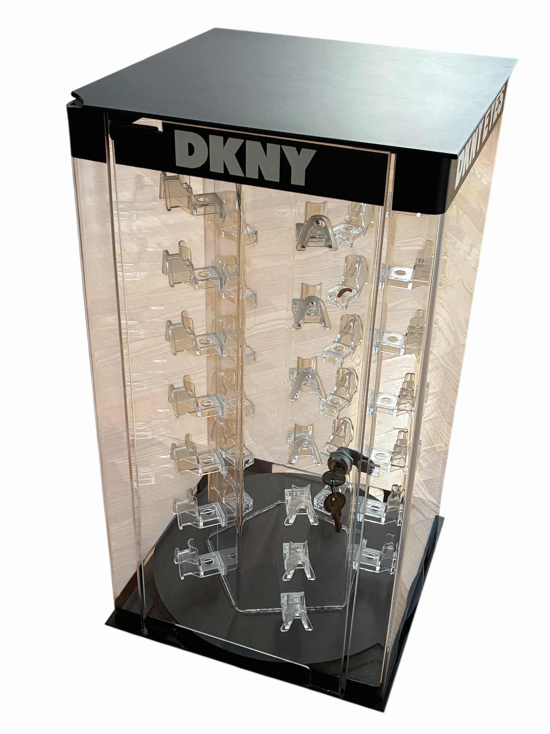 Photo 1 of DKNY EYES 35PC SUNGLASSES ROTATING DISPLAY CASE W KEY 13” X 24”