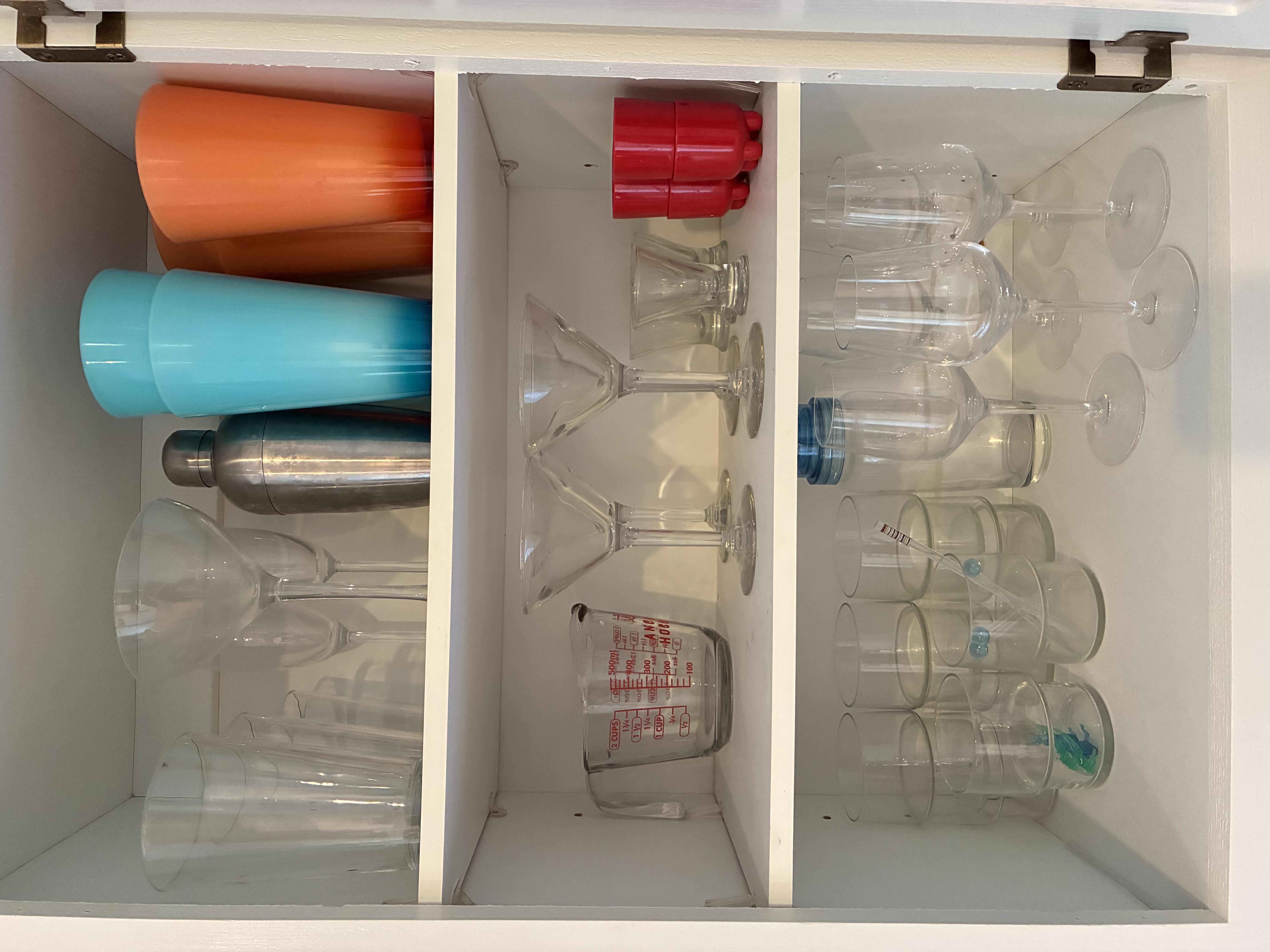 Photo 1 of CONTENTS OF CABINET-COCKTAIL DRINKING GLASSES, STAINLESS STEEL SHAKERS, BEVERAGE CUPS