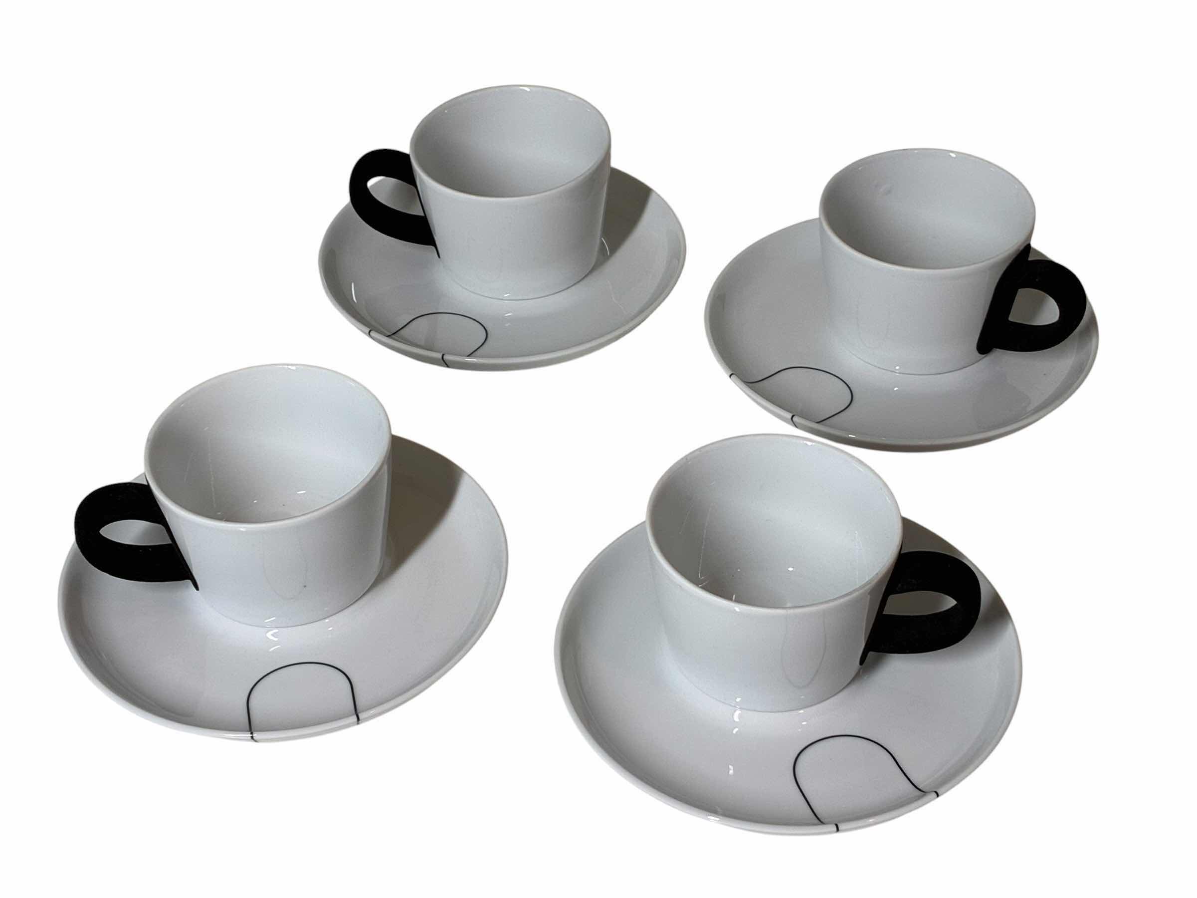 Photo 1 of KAHLA 8PC GERMANY BLACK & WHITE VELVET HANDLE TEA CUP/SAUCER SET