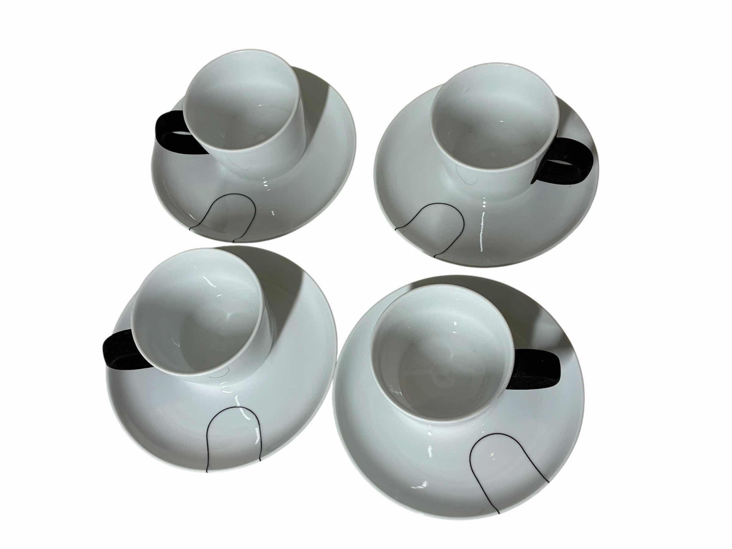 Photo 1 of KAHLA 8PC GERMANY BLACK & WHITE VELVET HANDLE TEA CUP/SAUCER SET