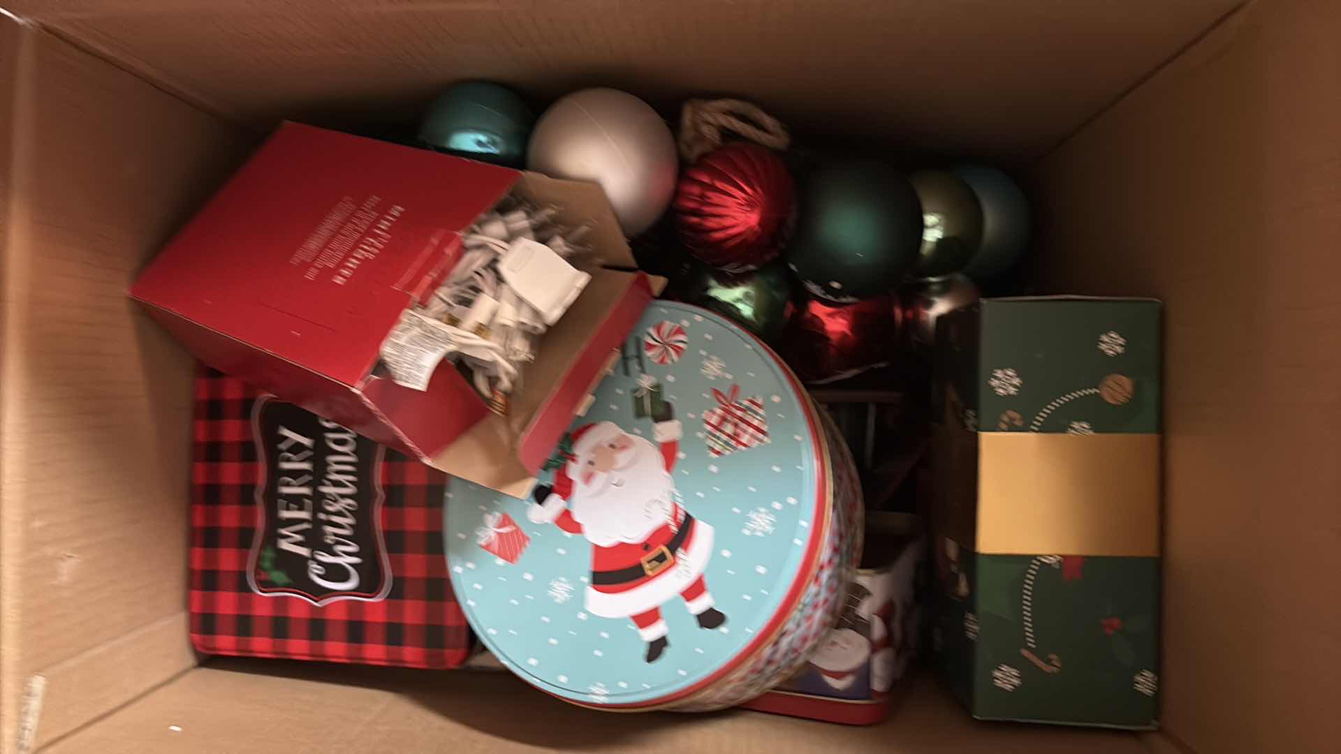 Photo 1 of (2) BOXES OF CHRISTMAS ORNAMENTS AND LARGE SIGN 24”X24”