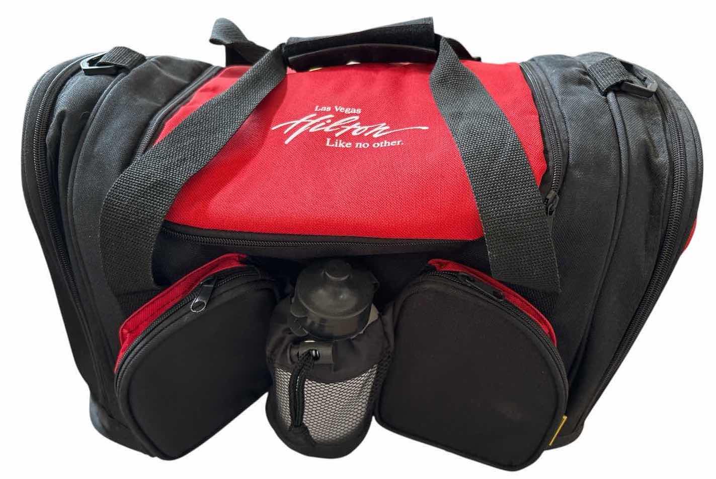 Photo 1 of VINTAGE LAS VEGAS HILTON INSULATED PICNIC PLUS BAG W REUSABLE UTENSILS – RED & BLACK 17”X10.5”H11.5”