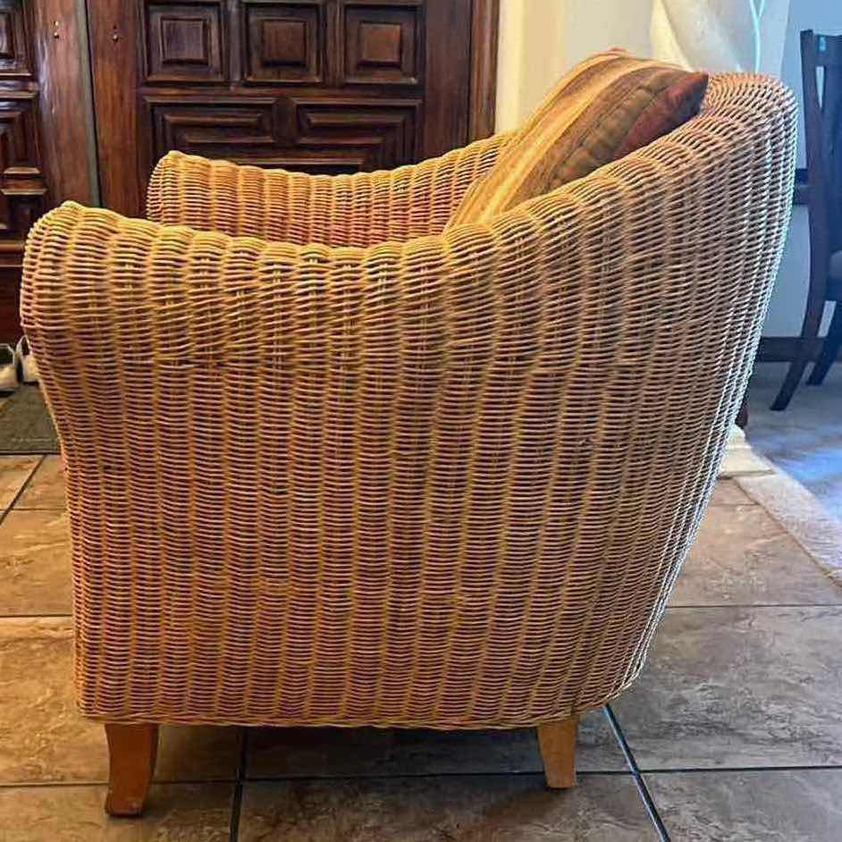 Photo 2 of RATTAN ACCENT CLUB CHAIR W ORANGE CUSHION & ACCENT PILLOW