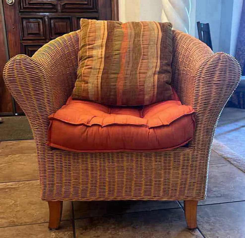 Photo 1 of RATTAN ACCENT CLUB CHAIR W ORANGE CUSHION & ACCENT PILLOW