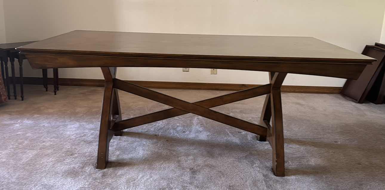 Photo 1 of SOLID WOOD DINING TABLE  42” X 72”