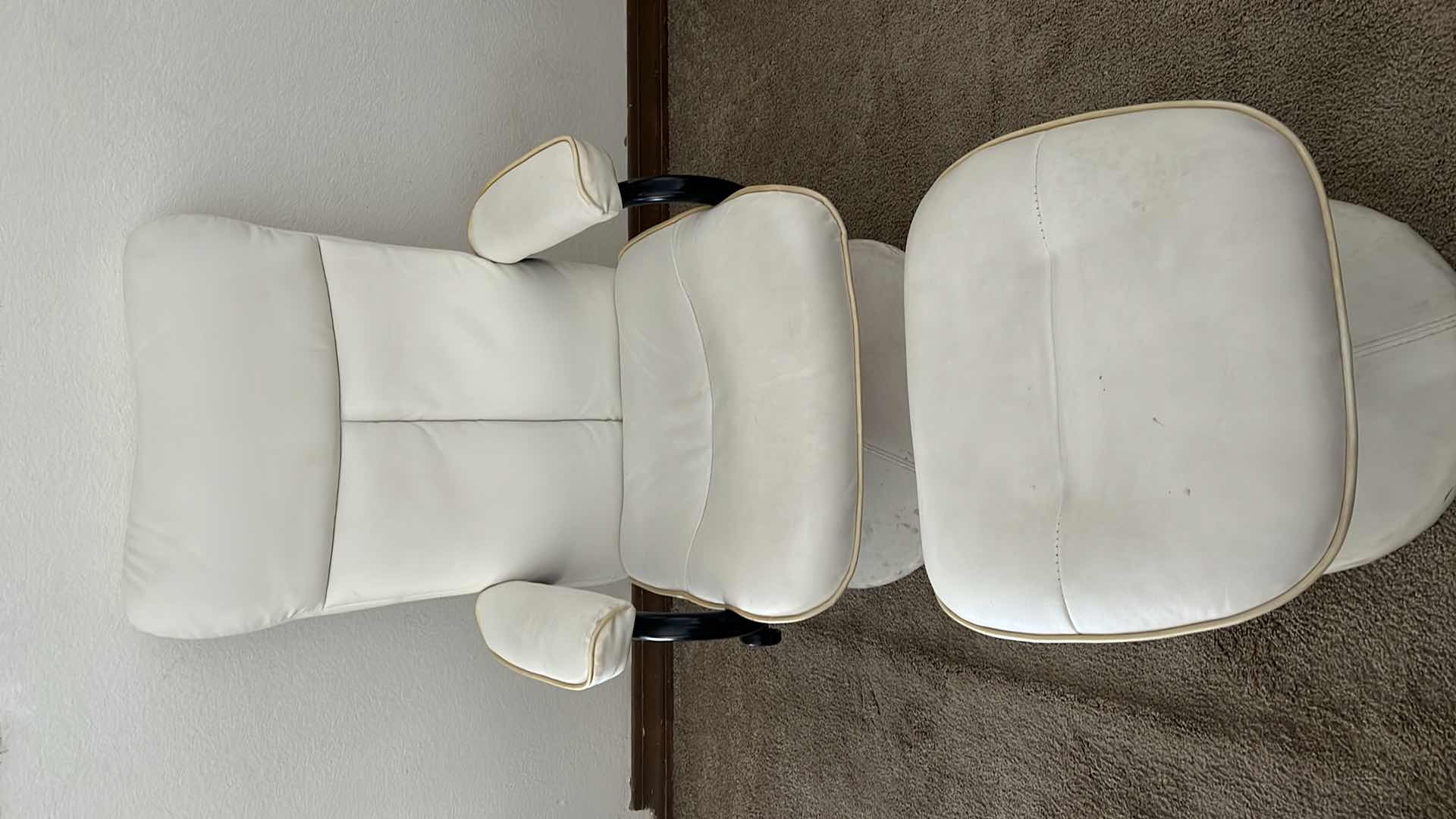 Photo 1 of WHITE LEATHER SWIVEL CHAIR W OTTOMAN