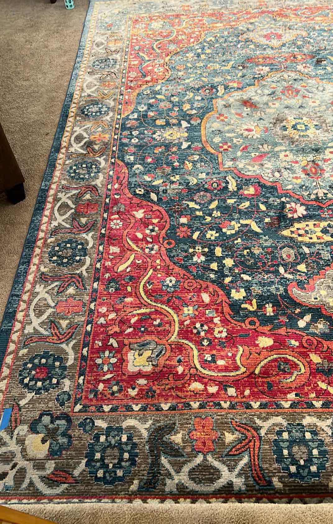 Photo 3 of 8’ x 12’ BLUE/RUST/CREAM MULTI-COLORED PATTERNED RUG.