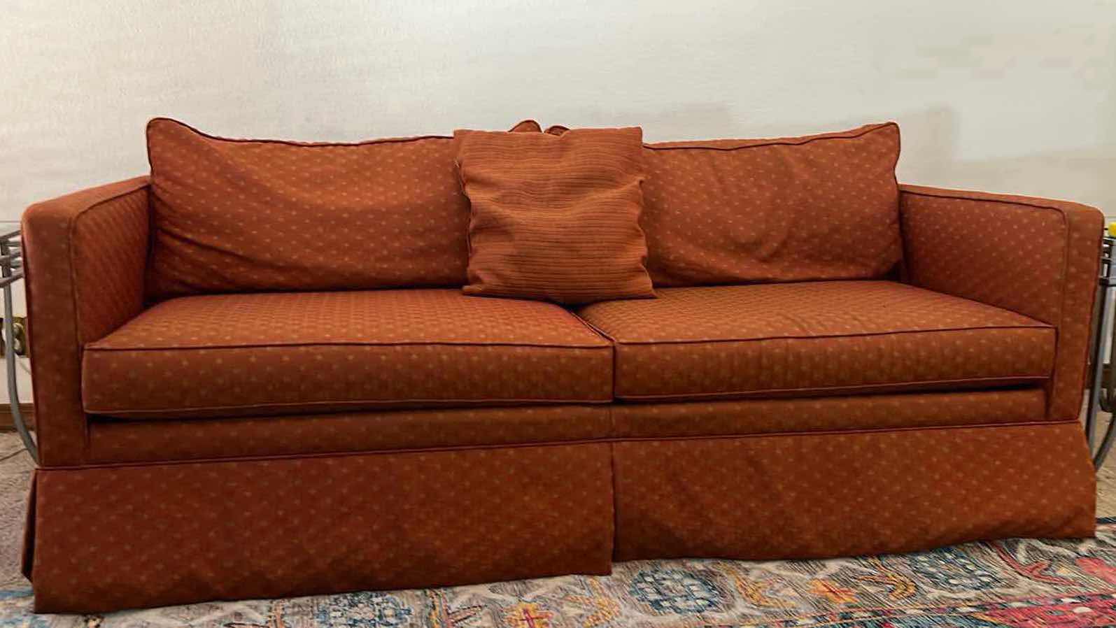 Photo 1 of 6’ UPHOLSTERED RUST AND CREAM COLORED SLEEPER SOFA.