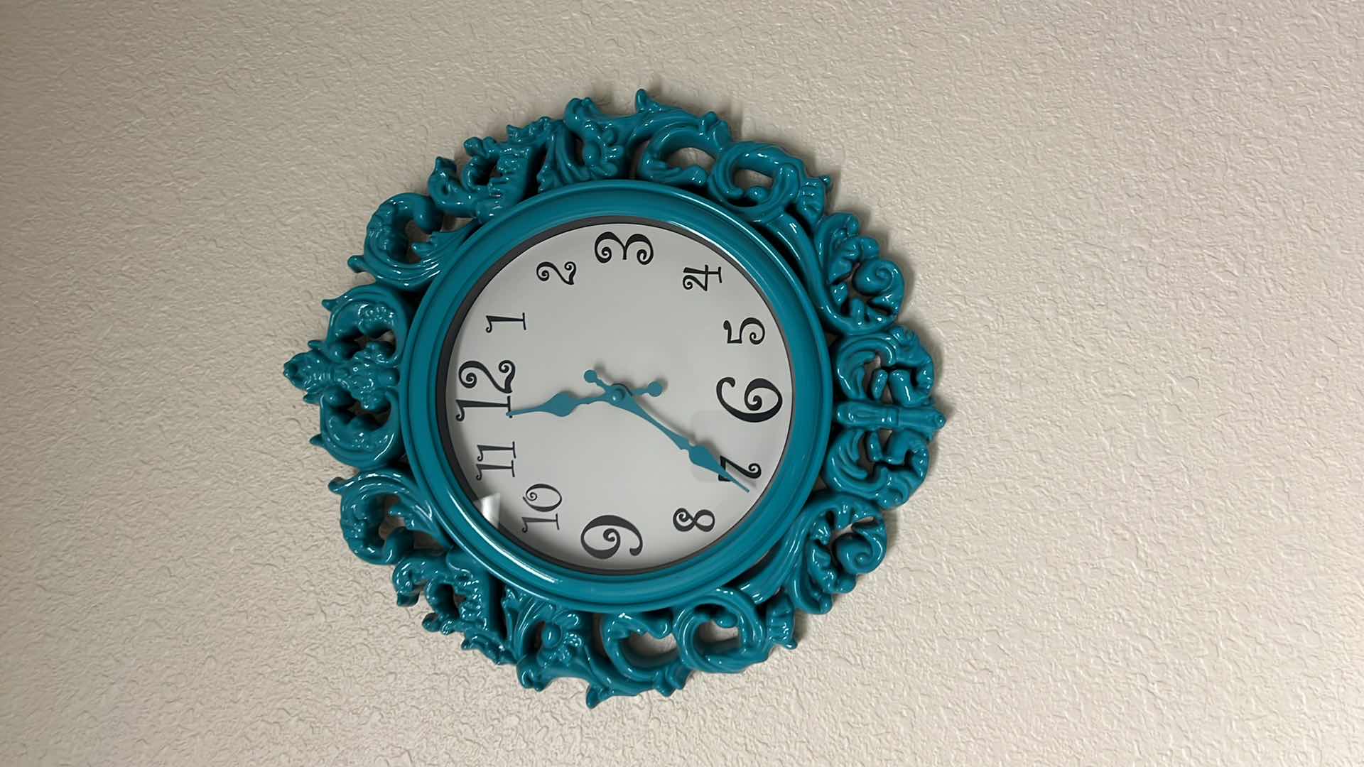 Photo 1 of 14" ROUND PLASTIC TEAL WALL CLOCK