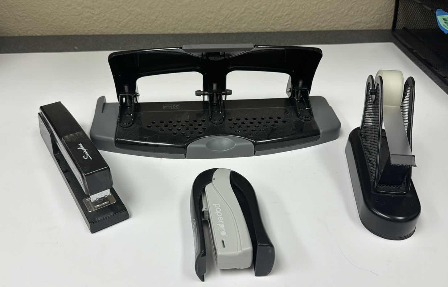 Photo 1 of OFFICE SUPPLIES: 
TAPE, HOLE PUNCH, STAPLERS