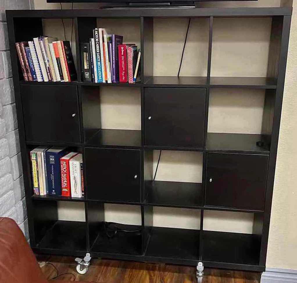 Photo 1 of IKEA BLACK KALLAX SHELVING UNIT  WHEELS W BOOKS  59" x 16" H60 