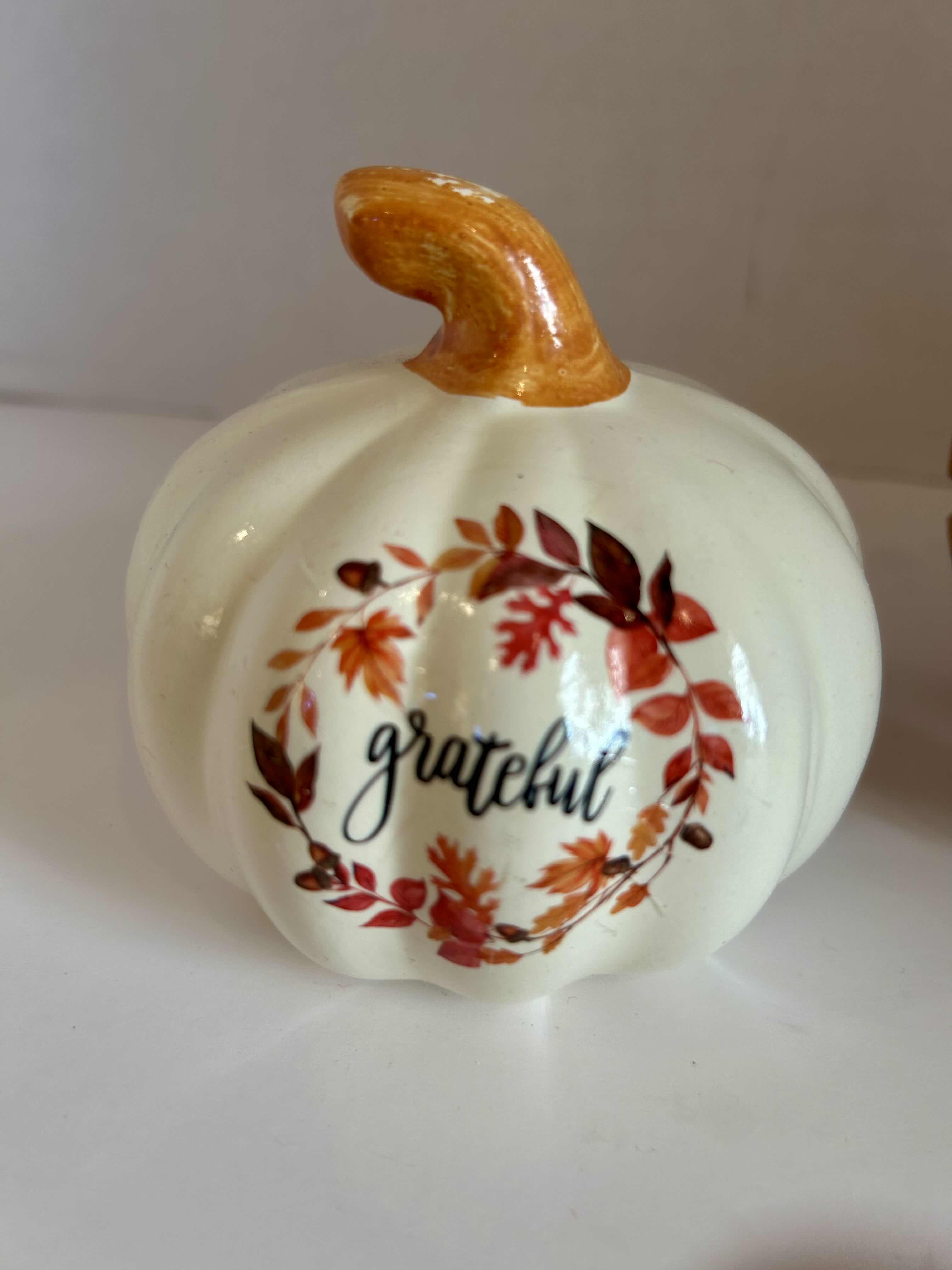 Photo 2 of 2 PIECES OF AUTUMN DECOR: (1) CERAMIC “GRATEFUL” PUMPKIN AND (1) WOOD TURKEY