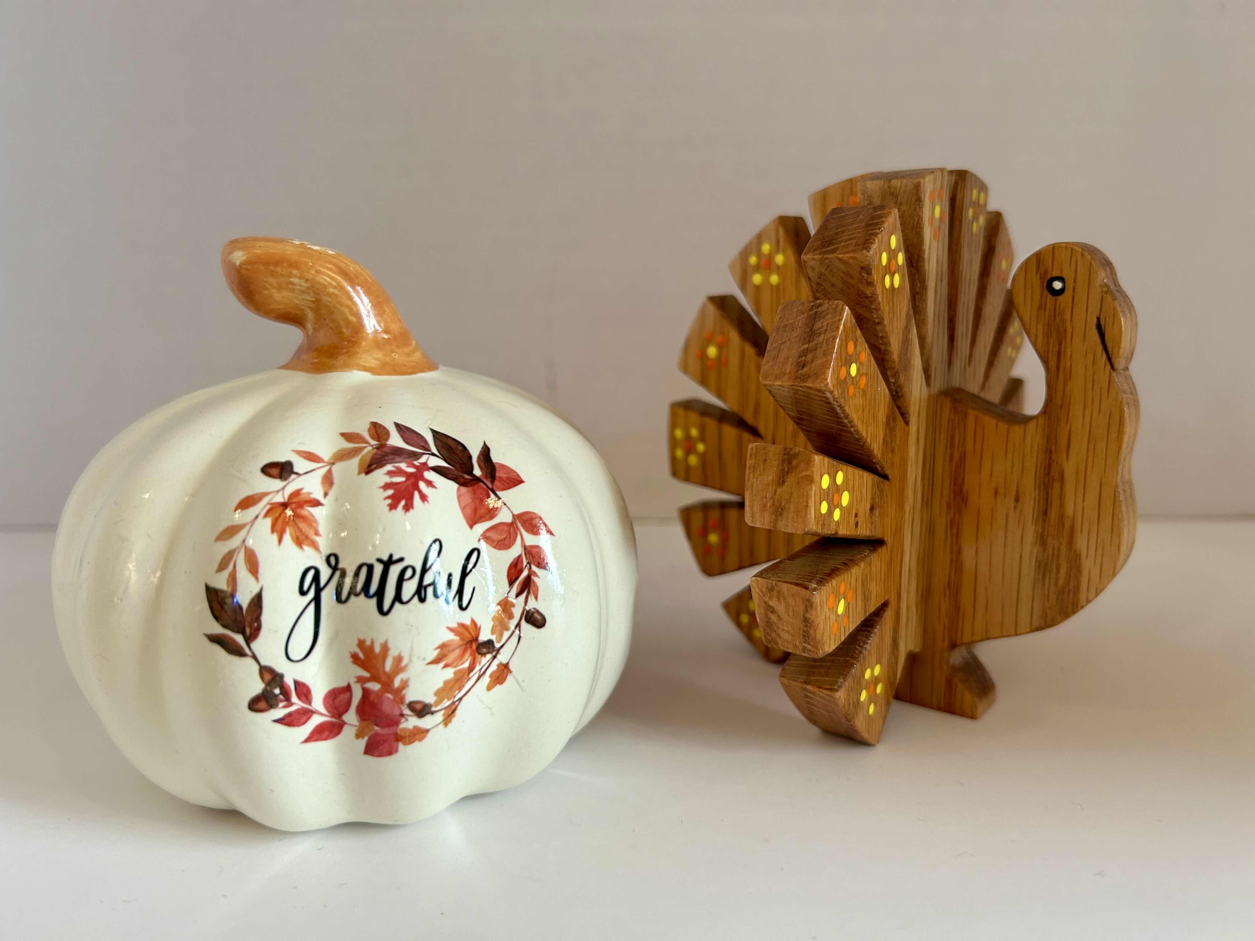 Photo 1 of 2 PIECES OF AUTUMN DECOR: (1) CERAMIC “GRATEFUL” PUMPKIN AND (1) WOOD TURKEY