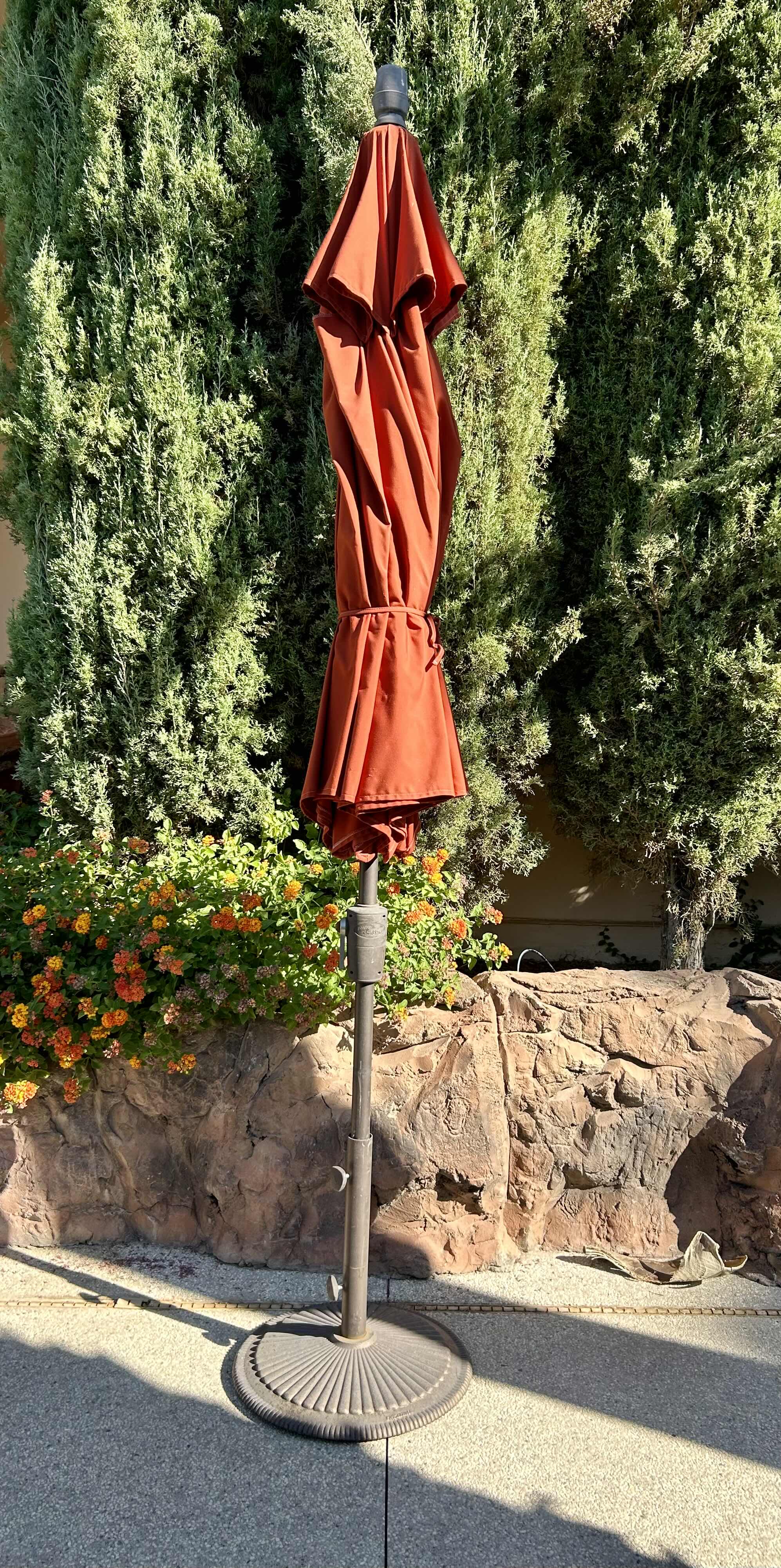 Photo 1 of 9’ SIENNA COLORED PATIO UMBRELLA WITH METAL BASE