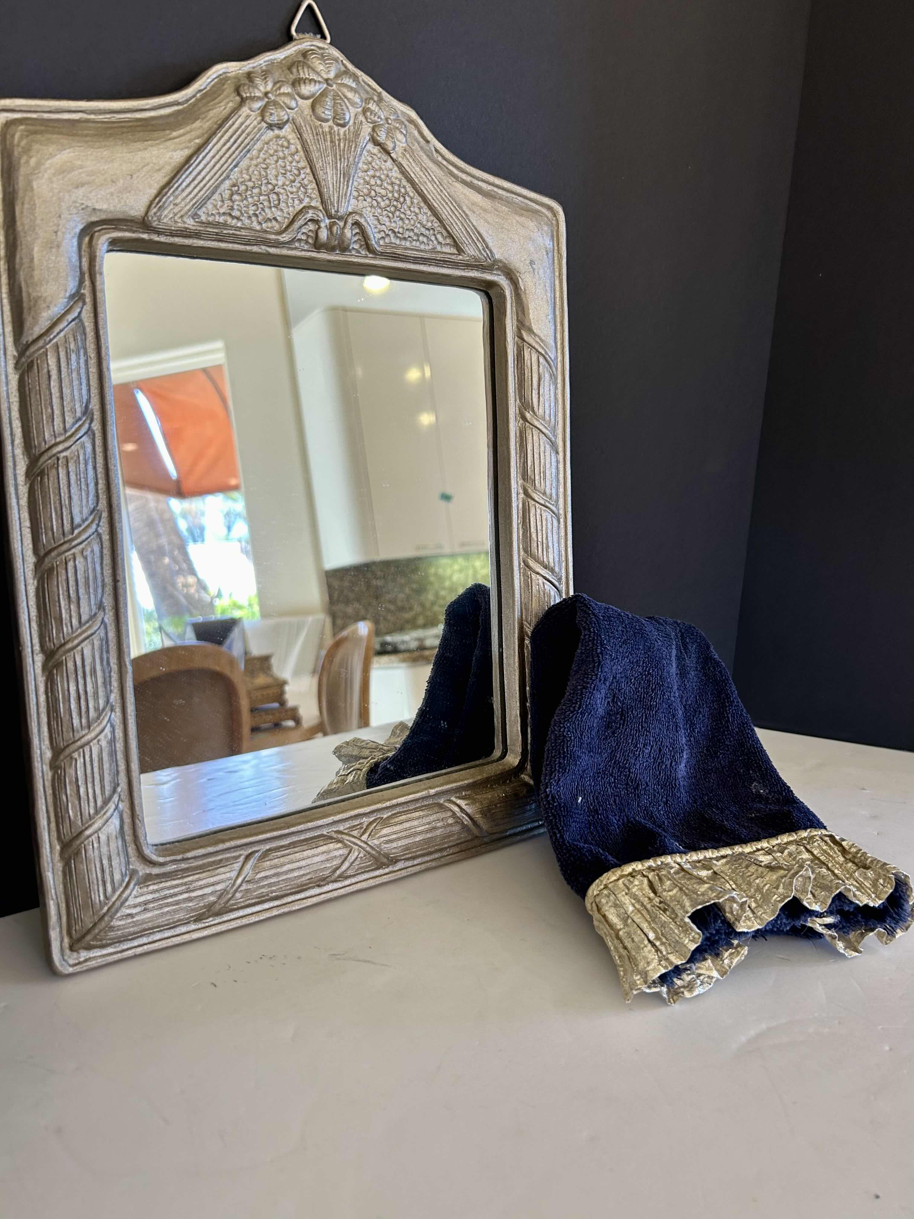 Photo 1 of DECORATIVE MIRROR 11” X 15” WITH NAVY AND GOLD RUFFLED HAND TOWEL