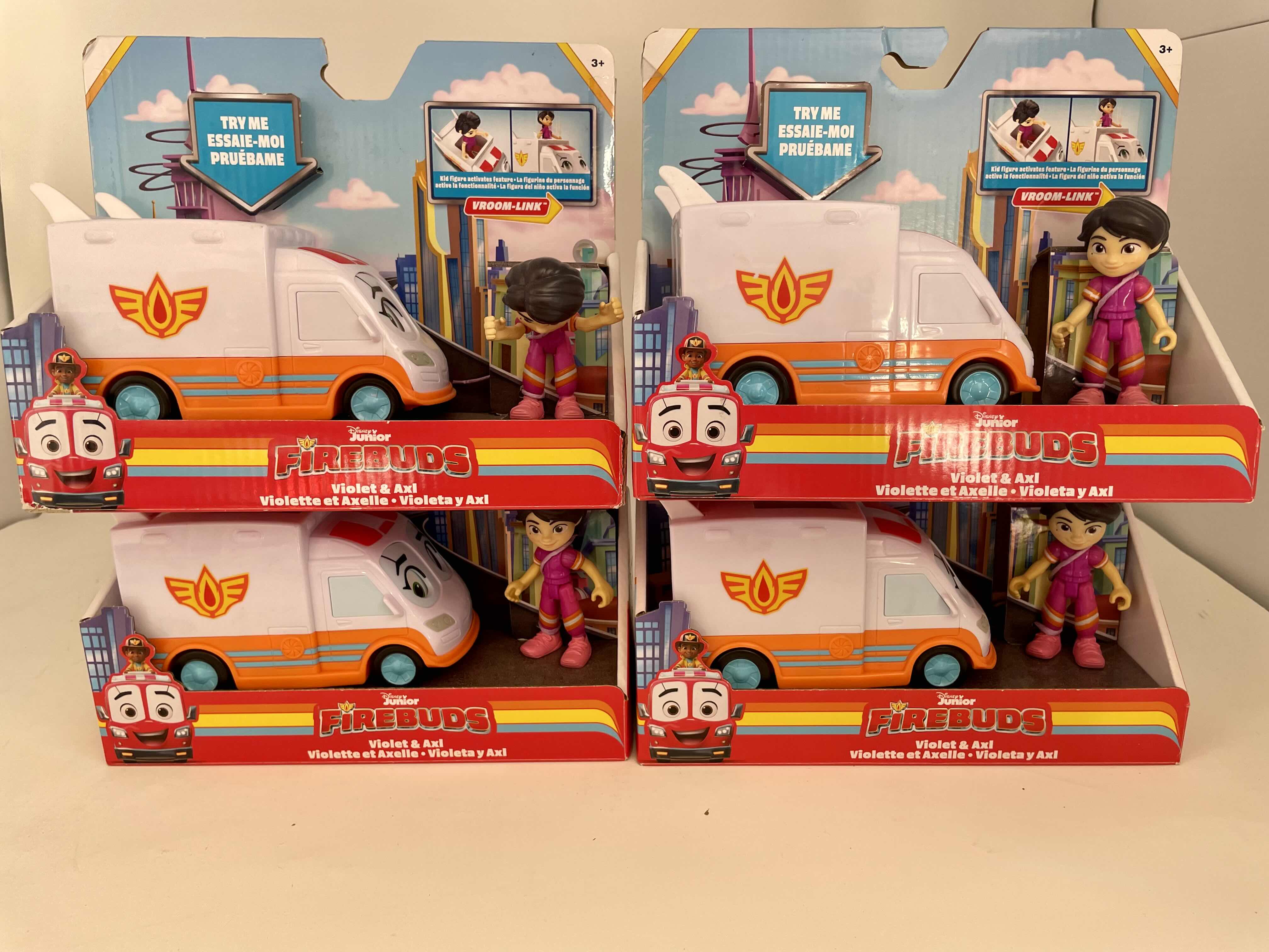 Photo 1 of BRAND NEW 4 - DISNEY JUNIOR FIREBUDS VIOLET AND AXL FIGURE AND AMBULANCE VEHICLE SET