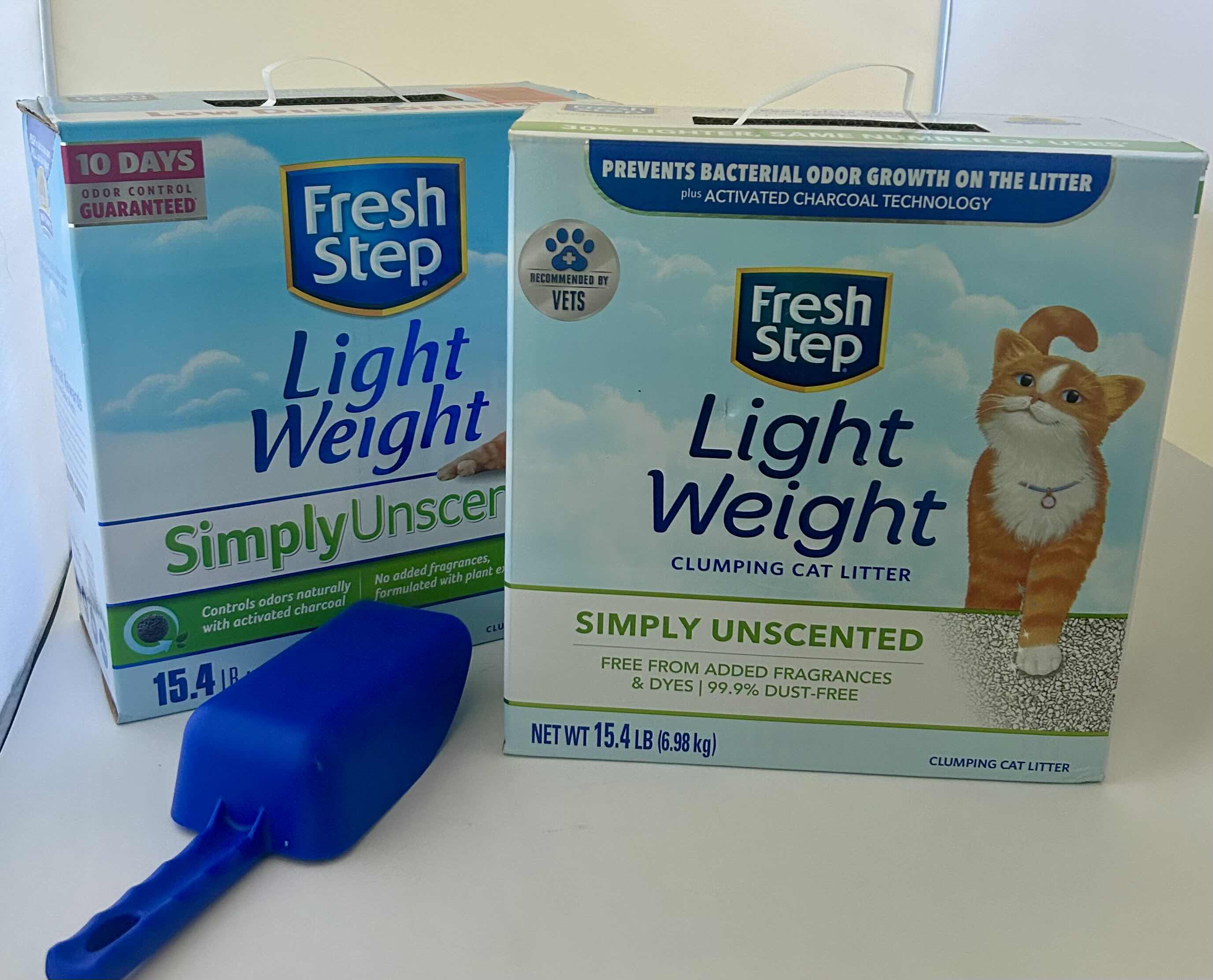 Photo 1 of 2- 15.4lb FRESH STEP SIMPLY UNSCENTED CLUMPING CAT LITTER AND BLUE SCOOP 