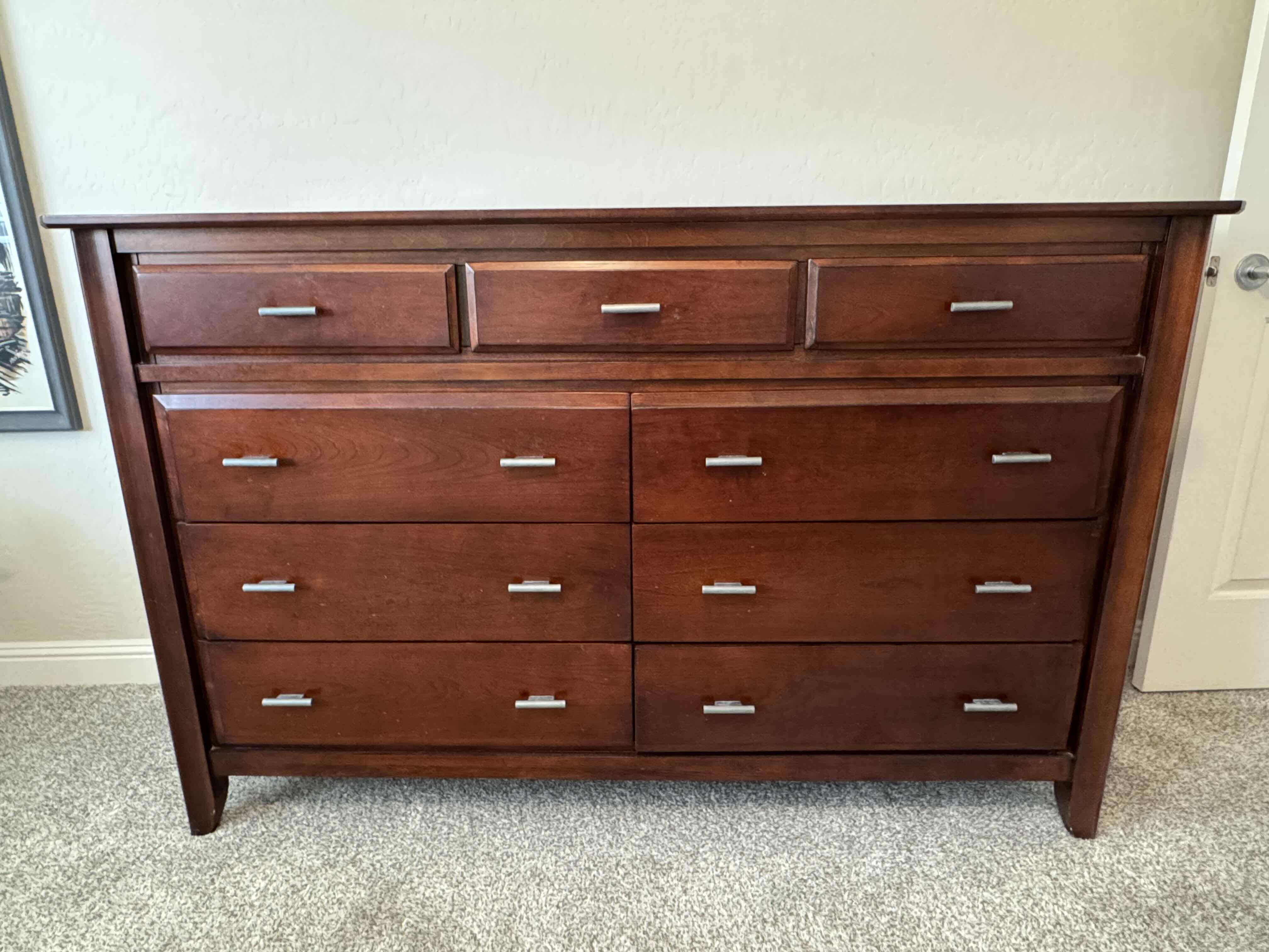 Photo 1 of FURNITURE- 9 DRAWER DRESSER-CHERRY WOOD STAINED- 64“ x 18“ H 41”. PART OF BEDROOM SET (SOLD SEPARATELY).