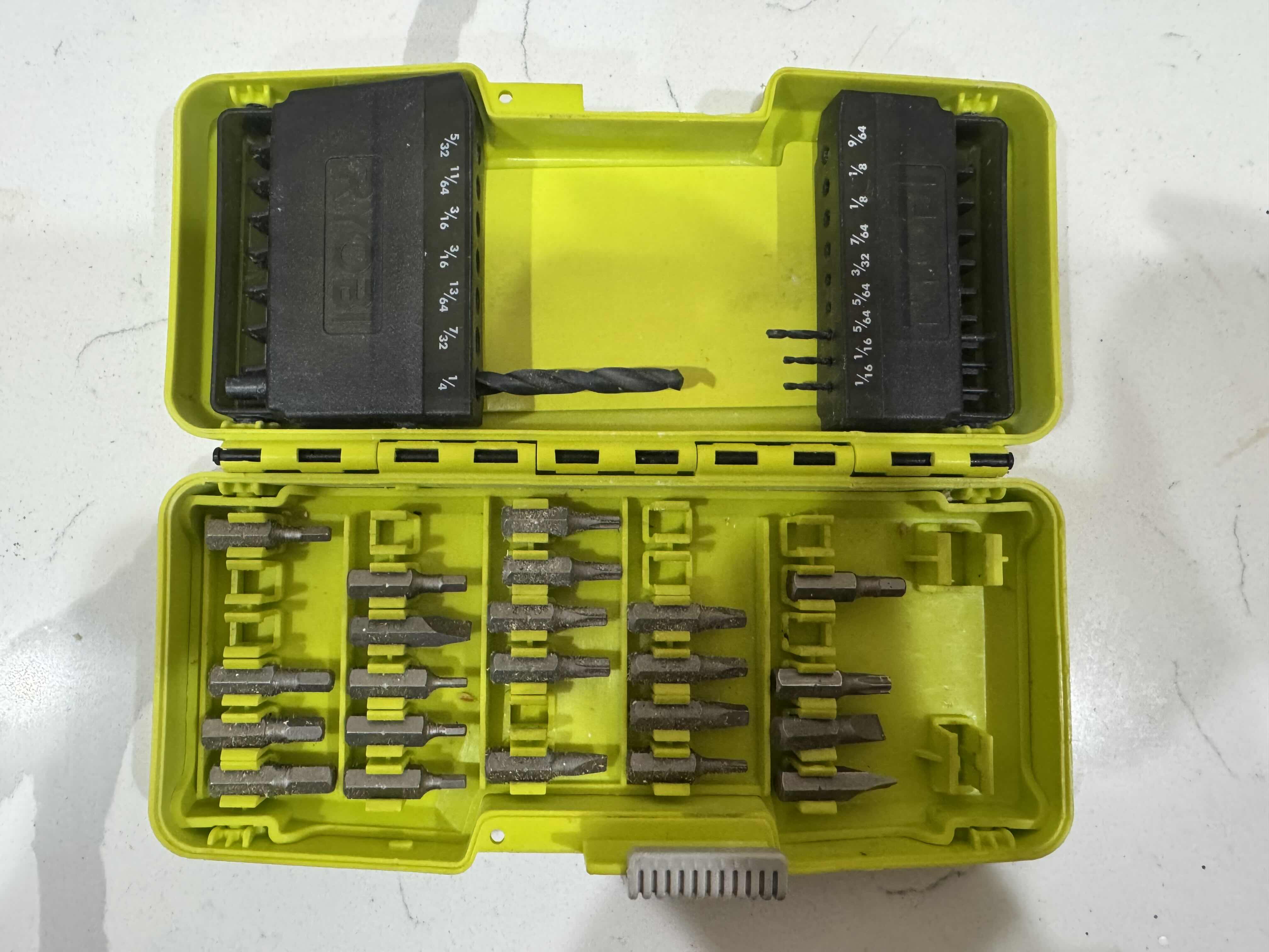 Photo 1 of POWER TOOLS-RYOBI POWER DRILL/DRIVER PLUS BITS, AND CARRYING BAGS.