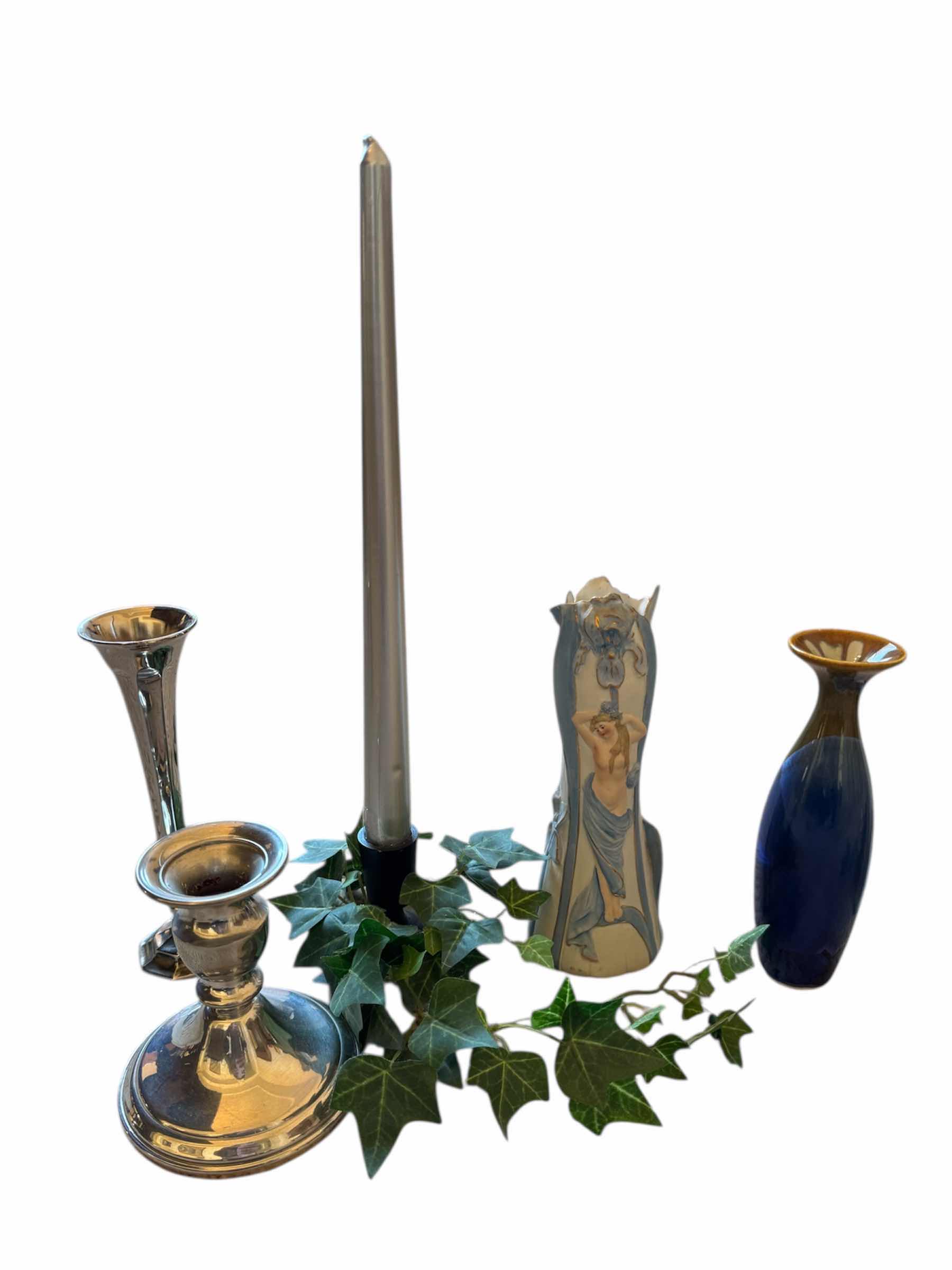 Photo 1 of 120
ASSORTED HOME DECOR, HOME ESSENTIALS, CANDLE HOLDERS, PORCELAIN VASES, SILVER PLATED VASES, ANGEL CANDLE HOLDER

LARGE CANDLE WITH CANDLE HOLDER
D2” X H14”