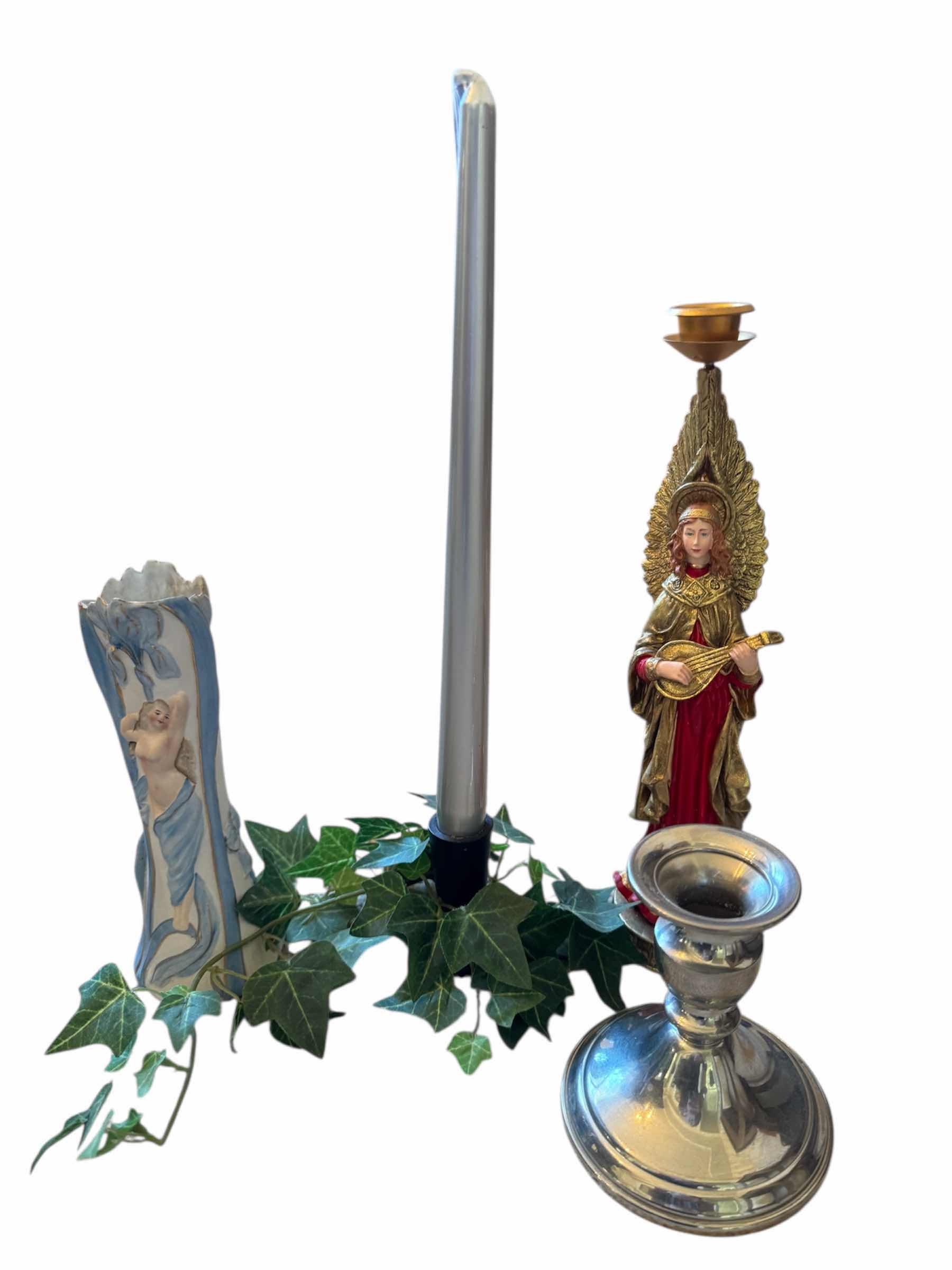 Photo 1 of 120
ASSORTED HOME DECOR, HOME ESSENTIALS, CANDLE HOLDERS, PORCELAIN VASES, SILVER PLATED VASES, ANGEL CANDLE HOLDER

LARGE CANDLE WITH CANDLE HOLDER
D2” X H14”