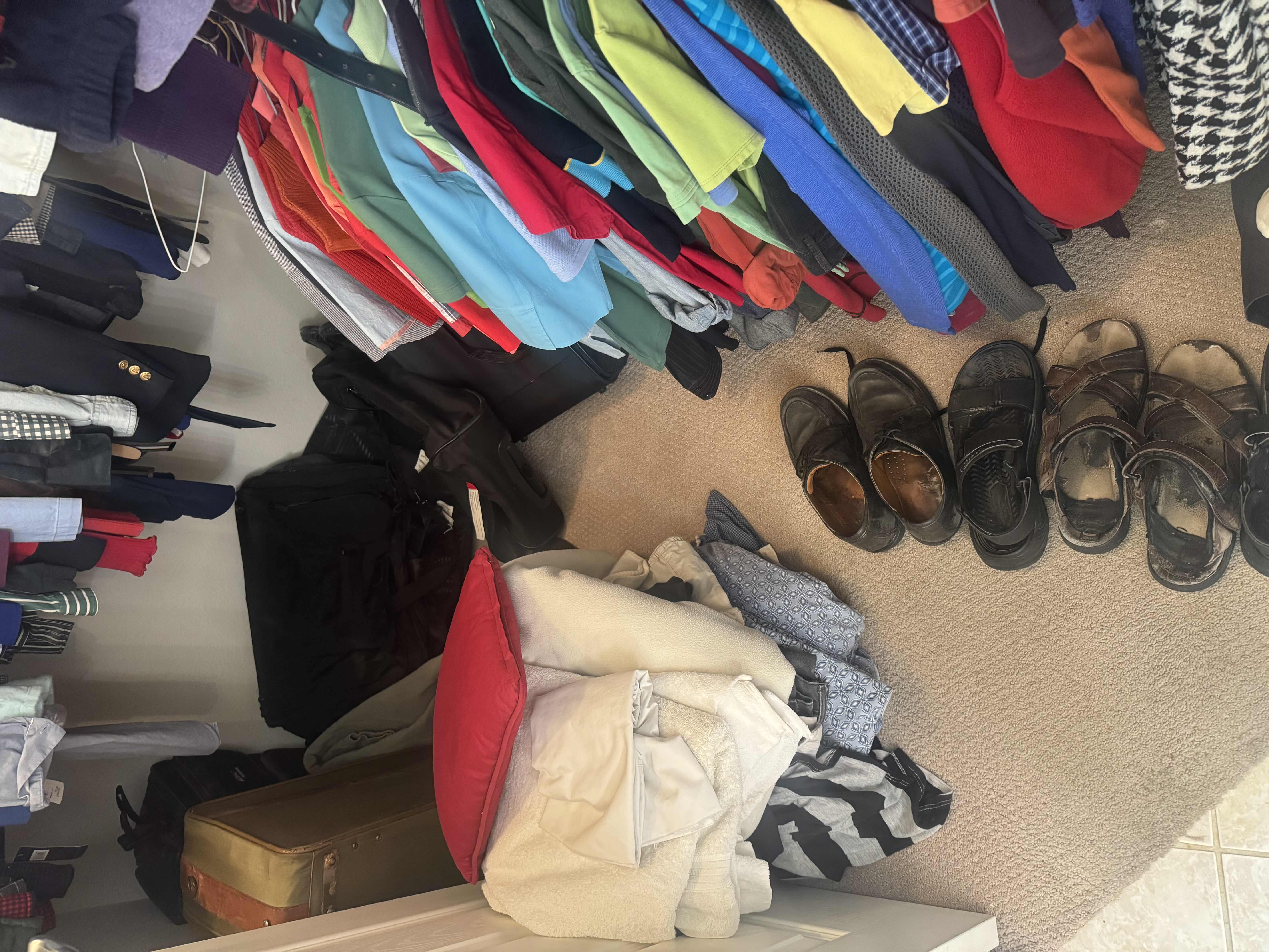 Photo 1 of CONTENTS OF CLOSET: MENS XL & WOMENS SMALL: MENS SIZE 10 SHOES, LUGGAGE AND LINENS