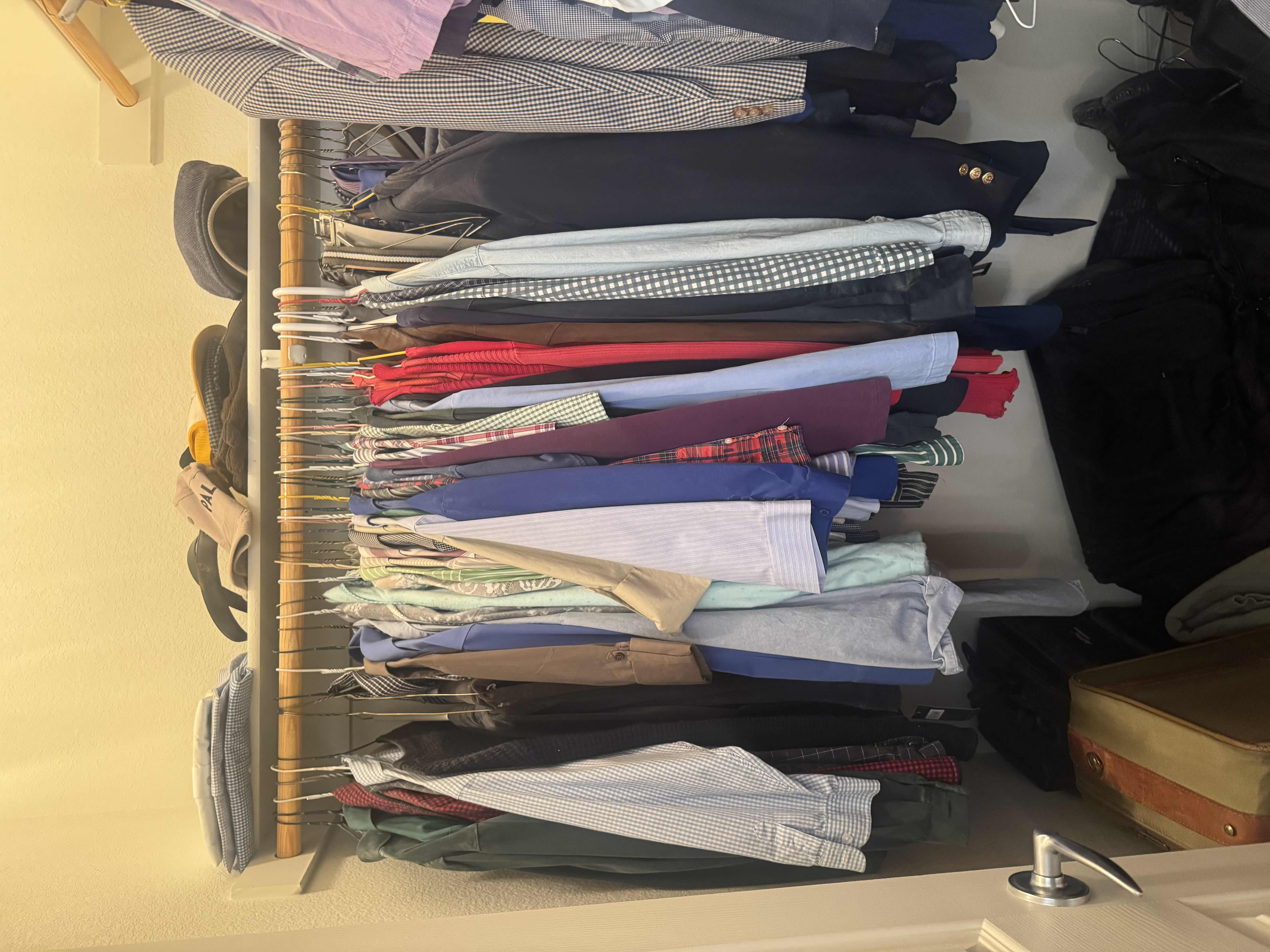 Photo 1 of CONTENTS OF CLOSET: MENS XL & WOMENS SMALL: MENS SIZE 10 SHOES, LUGGAGE AND LINENS
