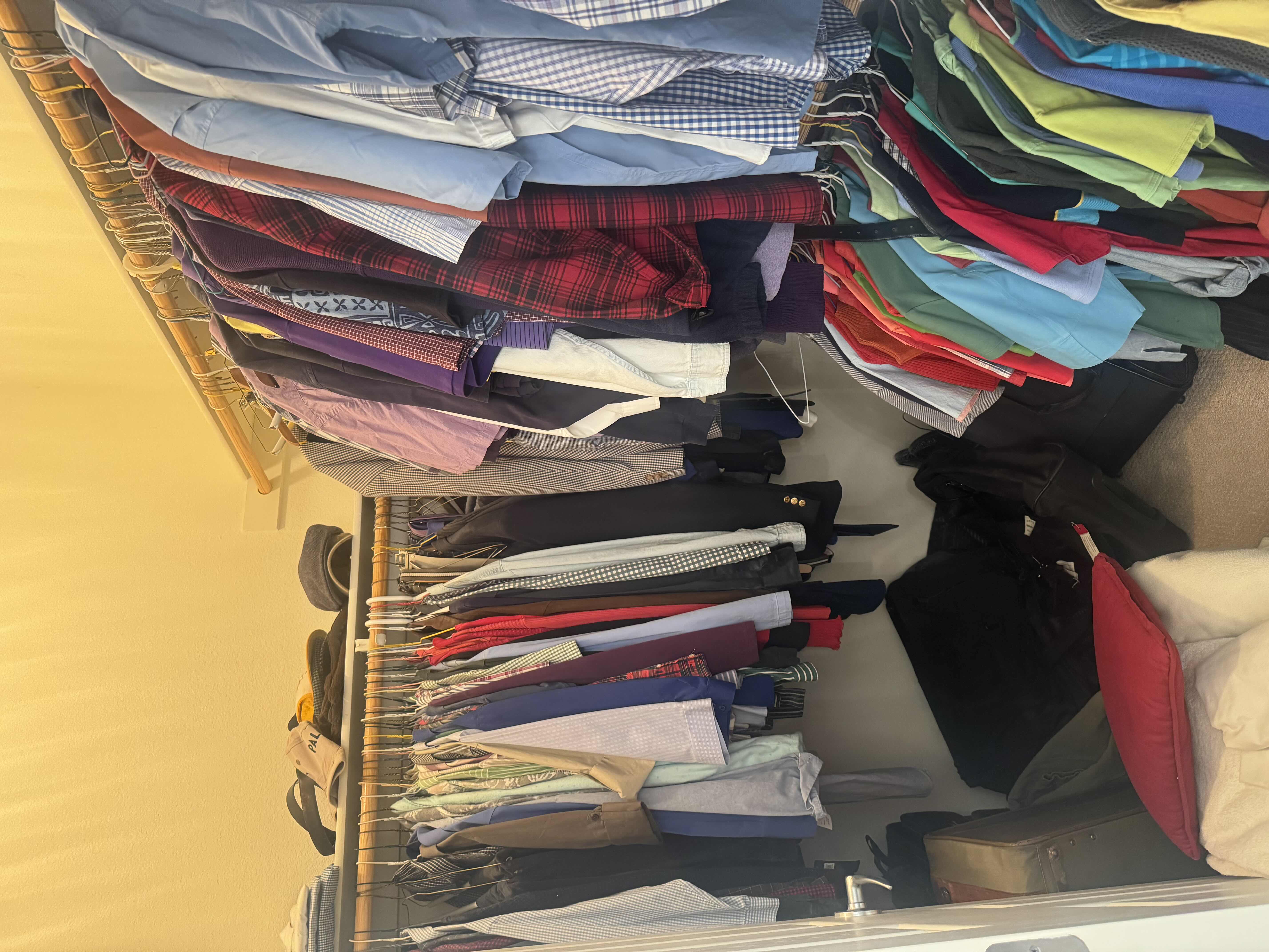 Photo 1 of CONTENTS OF CLOSET: MENS XL & WOMENS SMALL: MENS SIZE 10 SHOES, LUGGAGE AND LINENS