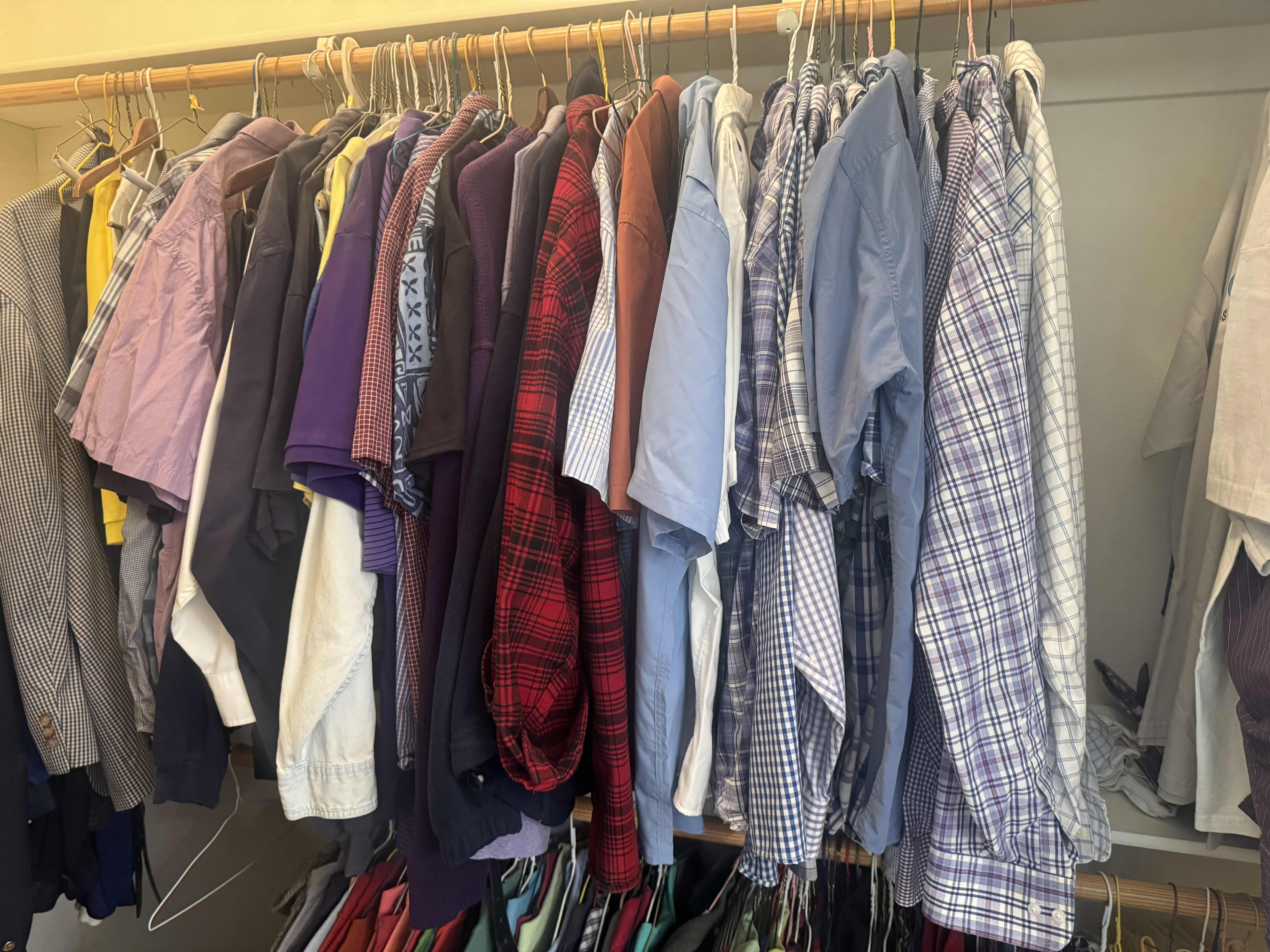 Photo 1 of CONTENTS OF CLOSET: MENS XL & WOMENS SMALL: MENS SIZE 10 SHOES, LUGGAGE AND LINENS